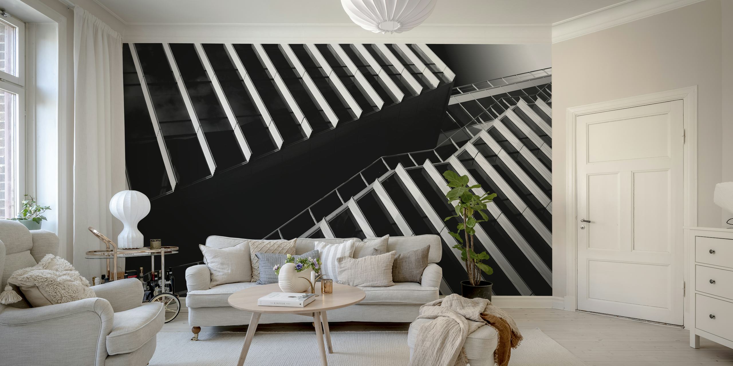 Black and white architectural wall mural featuring the upward view between high-rise buildings