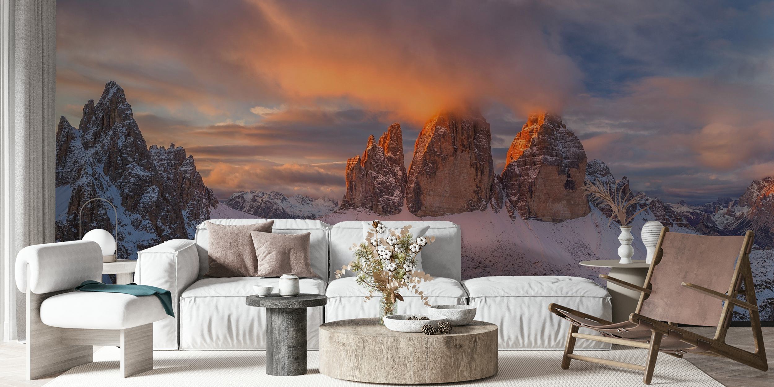Panoramic wall mural of a sunrise over snowy mountain peaks with vibrant orange and blue sky