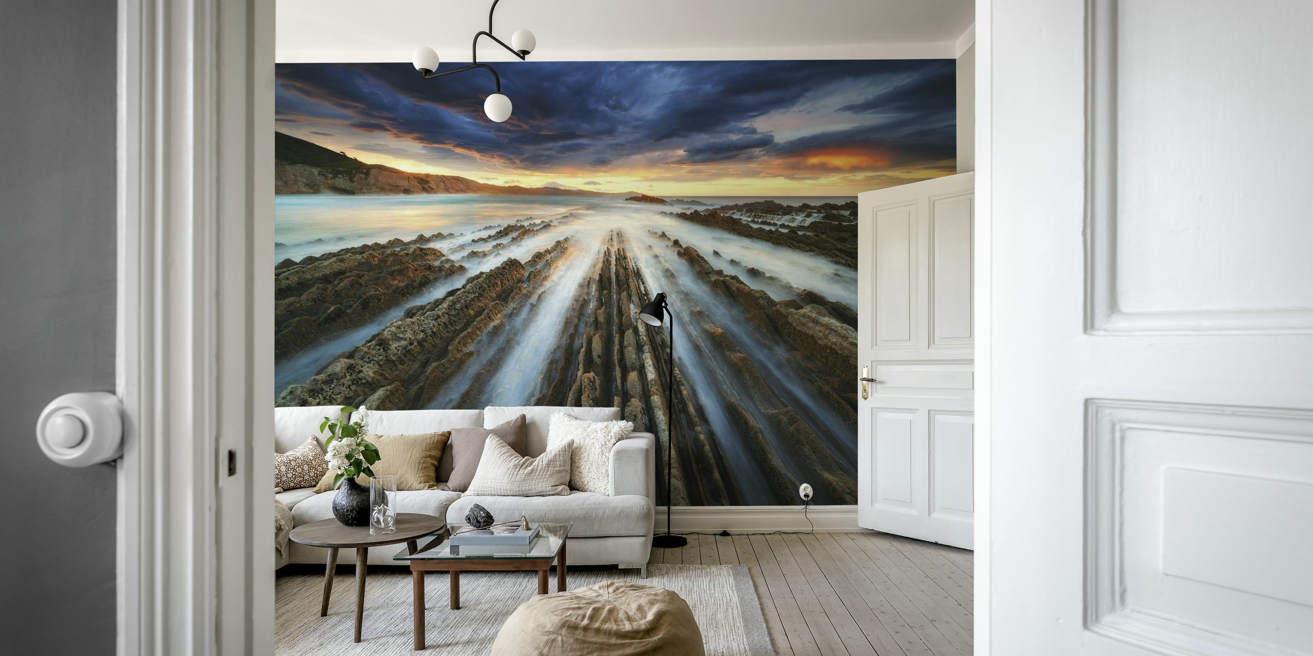Zumaia Flysch wall mural depicting layered rock formations and ocean sunset
