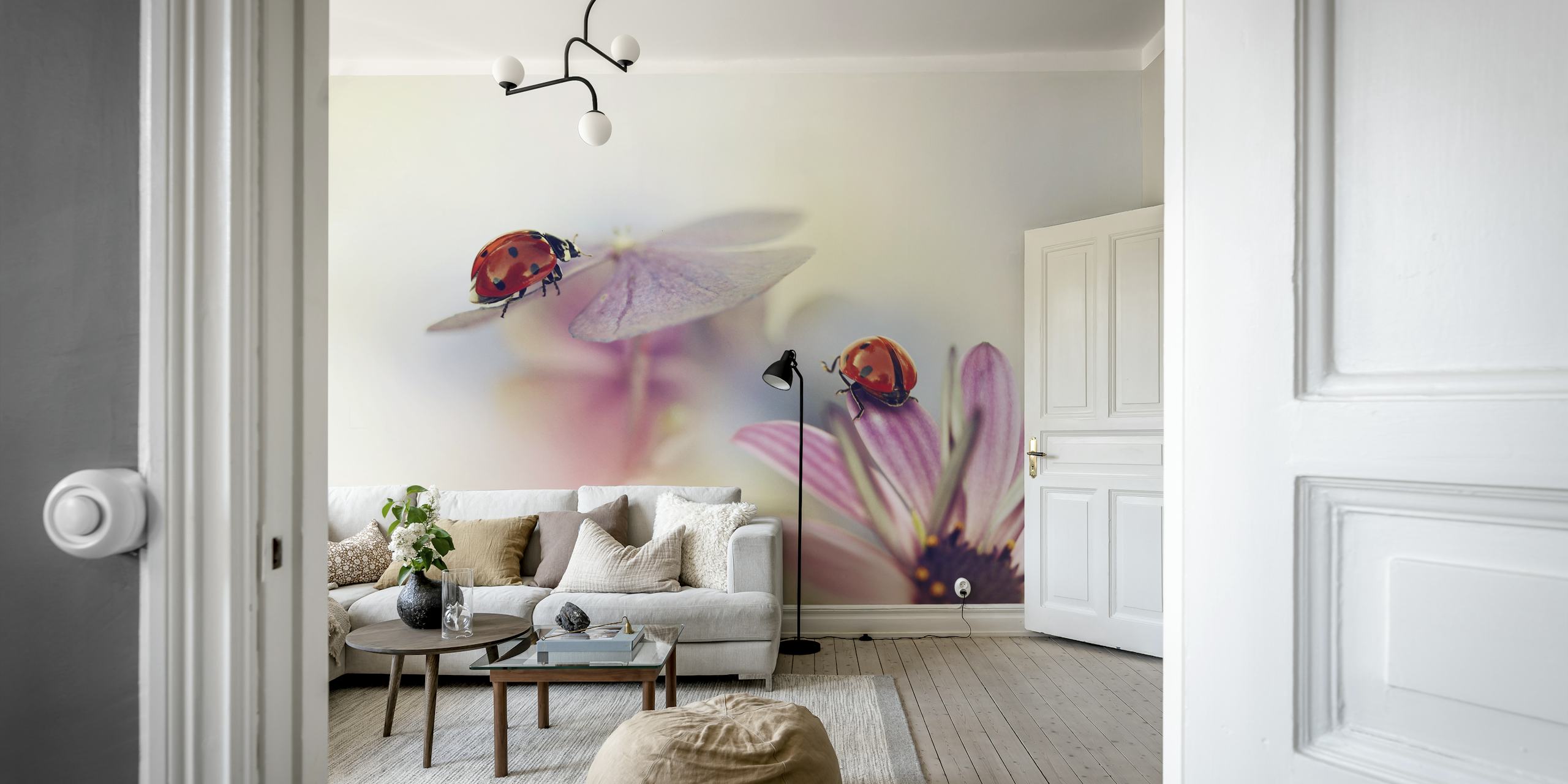 Pink floral design with ladybugs in a soft focus wallpaper
