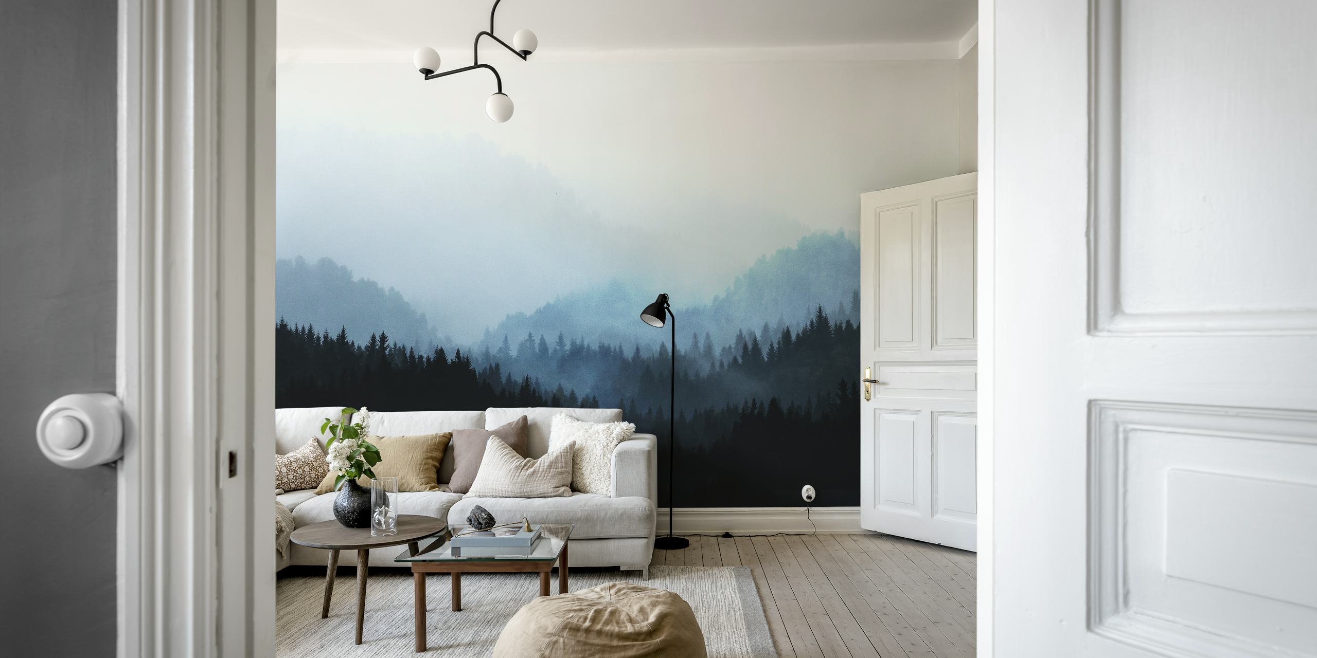Dark forest landscape with fog and mountain silhouettes wallpaper