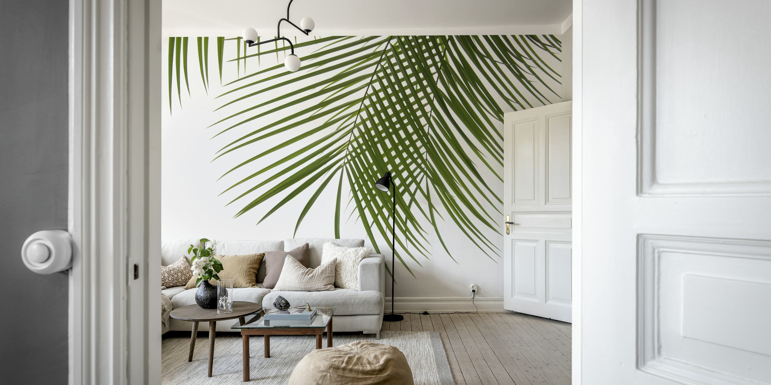 Palm foliage wallpaper design in a room