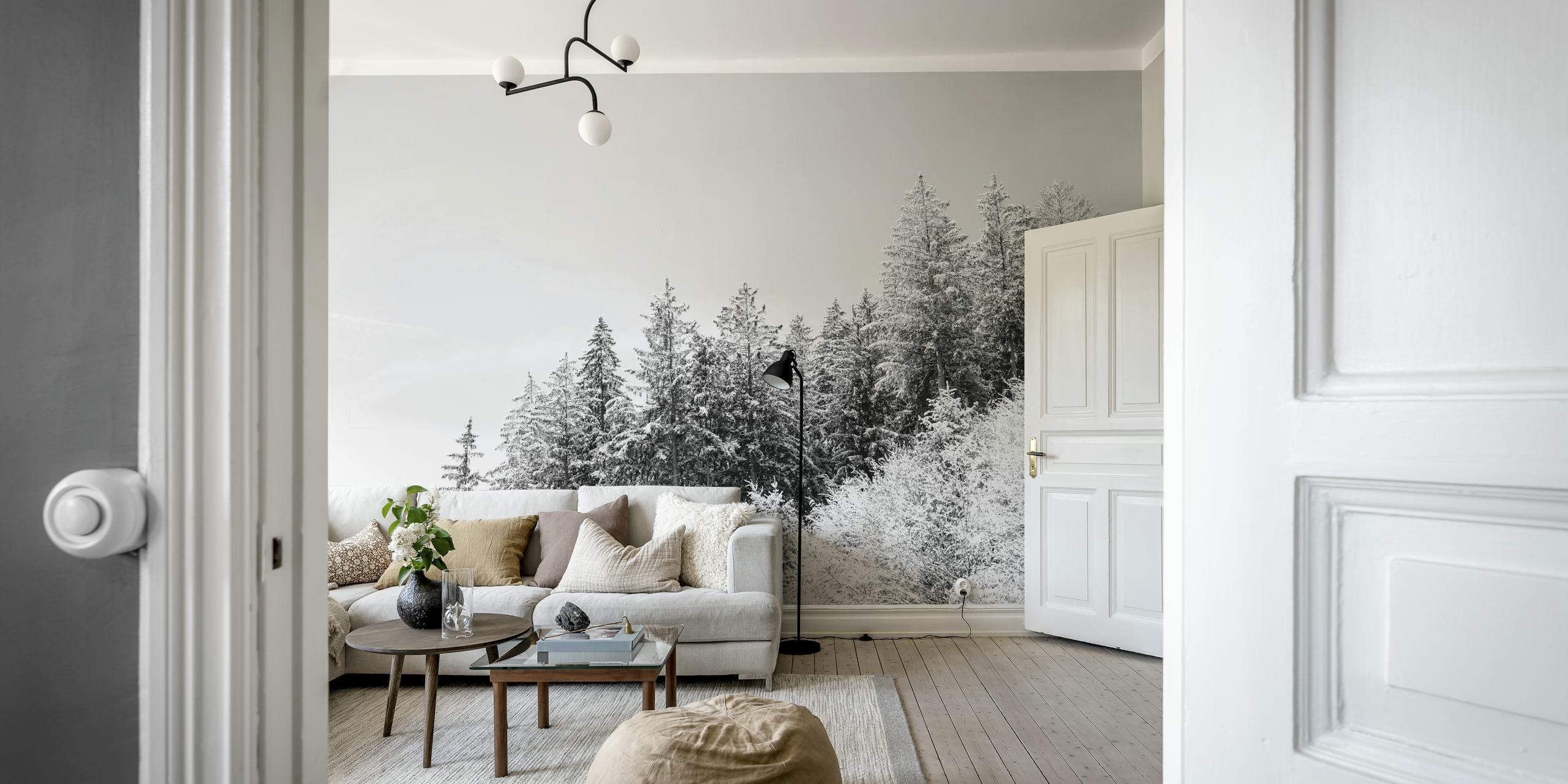 Snow-covered evergreen trees on a gray background wallpaper