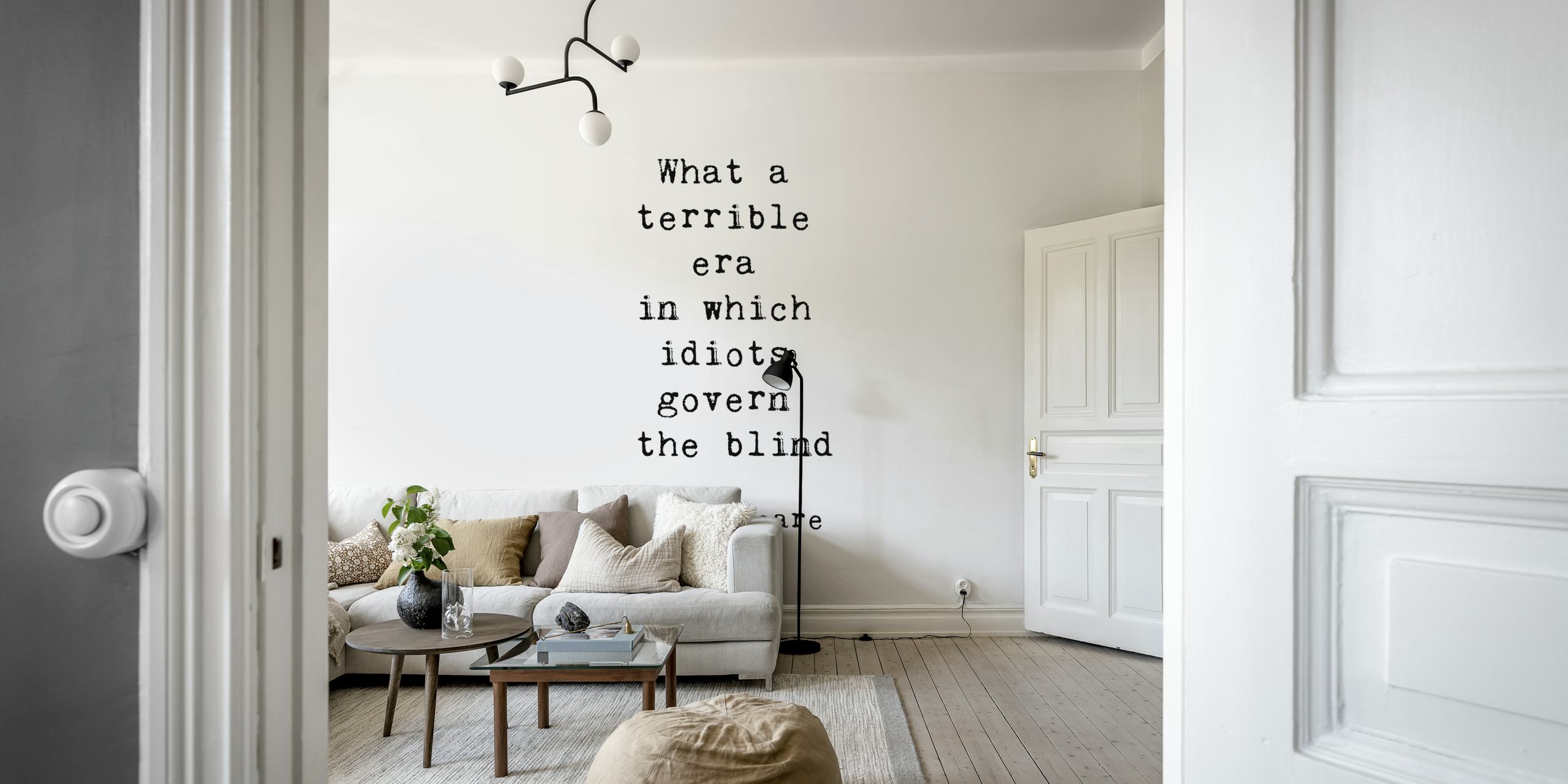 Black text 'What a terrible era in which idiots govern the blind' on white background wallpaper