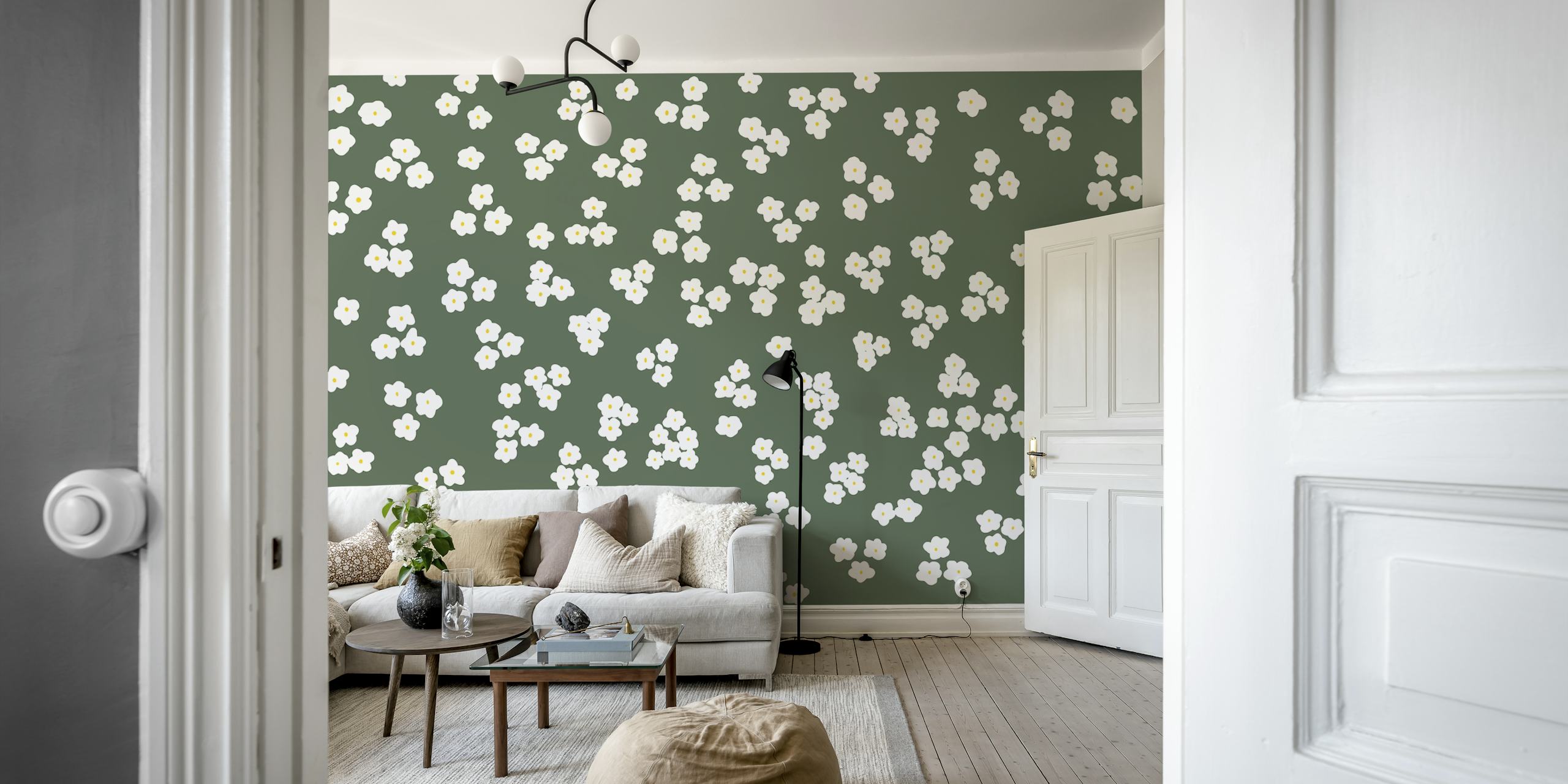 Floral wallpaper featuring white daisies on green
