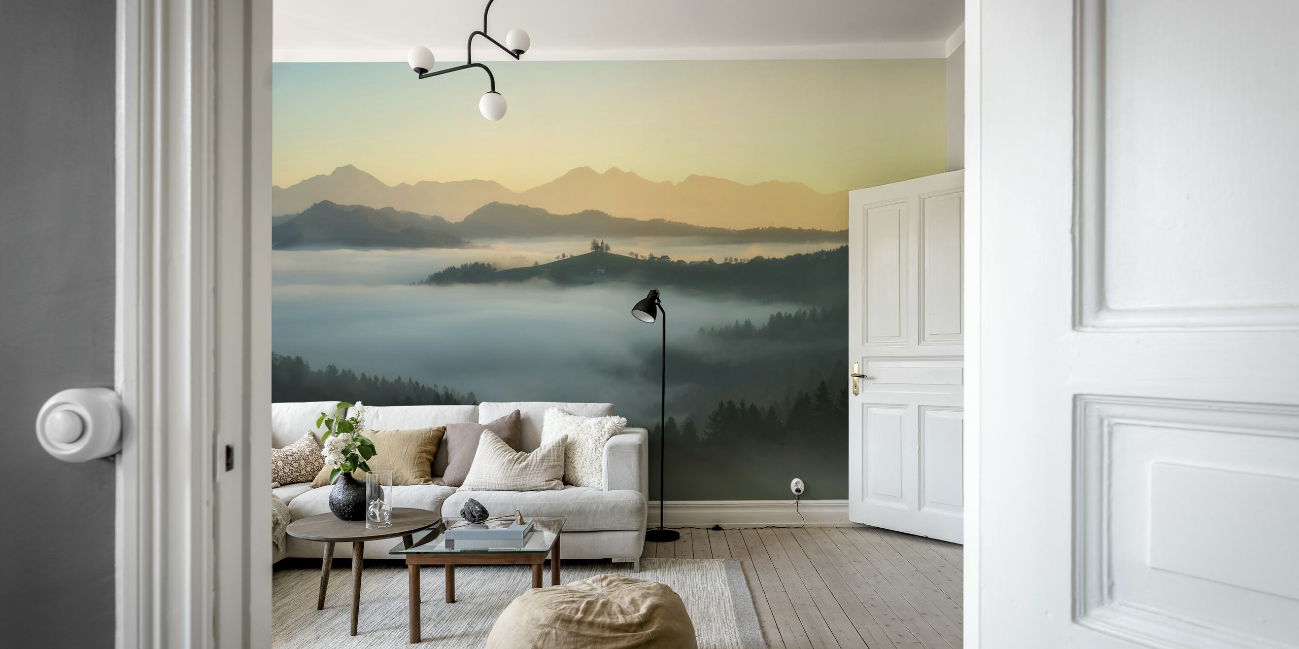 Misty mountain landscape fading into morning light wallpaper