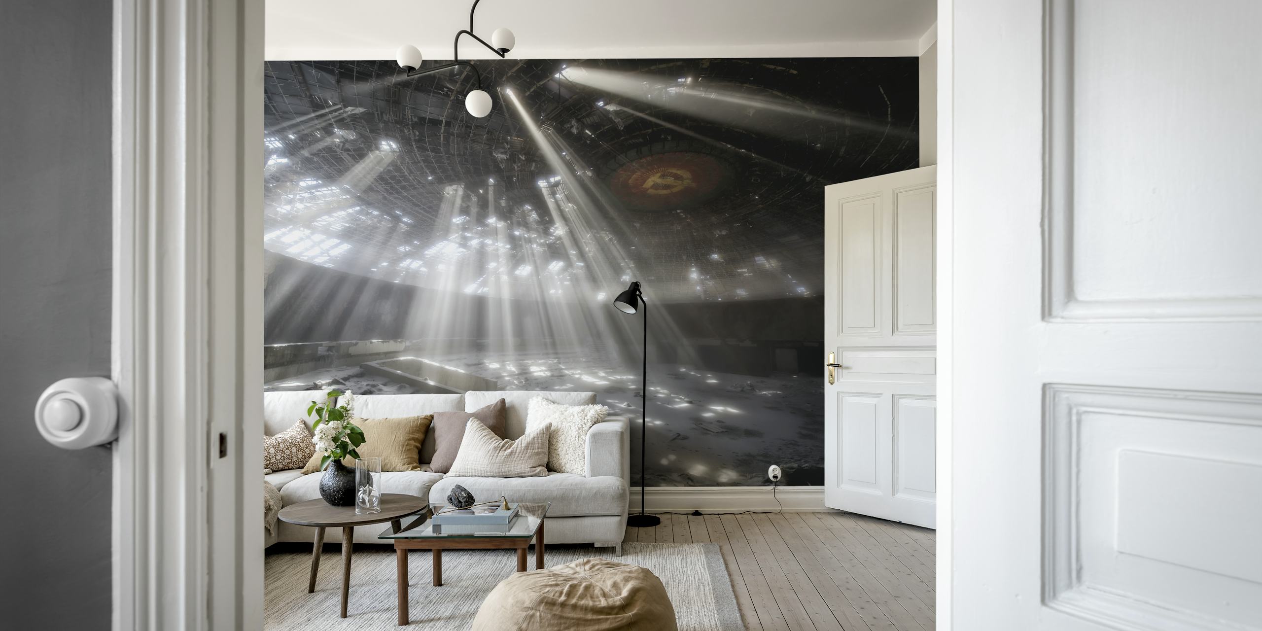 Buzludzha wall mural depicting light rays in an abandoned building