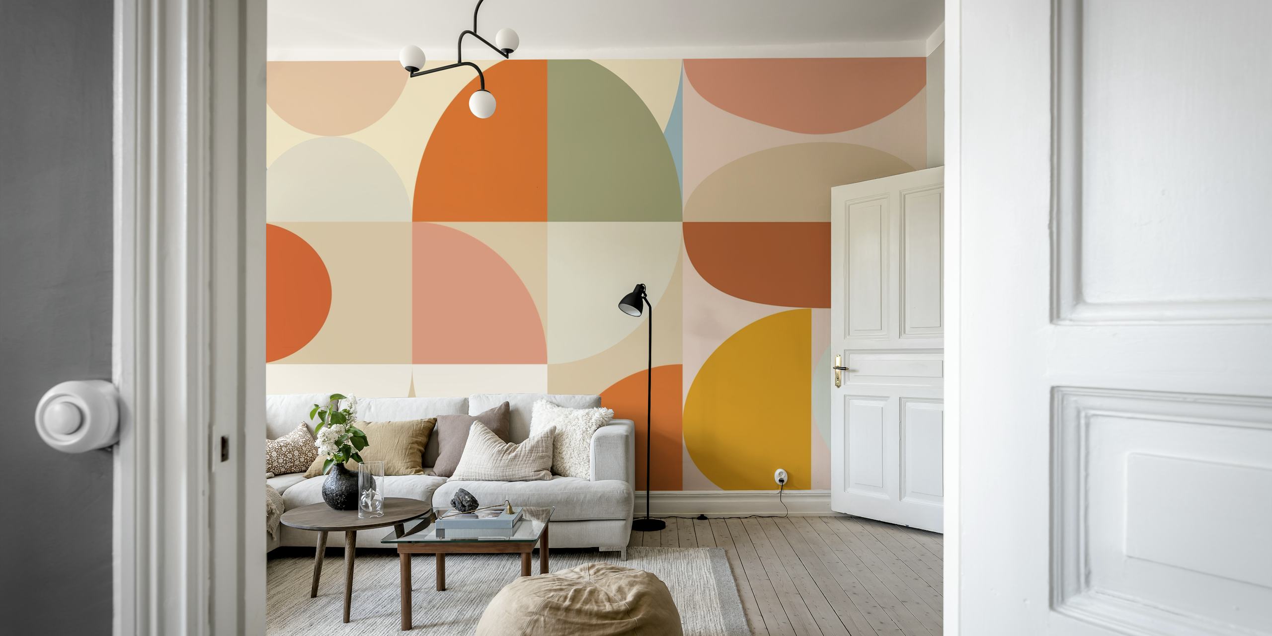 Geometric pastel shapes in orange, pink, and green wallpaper