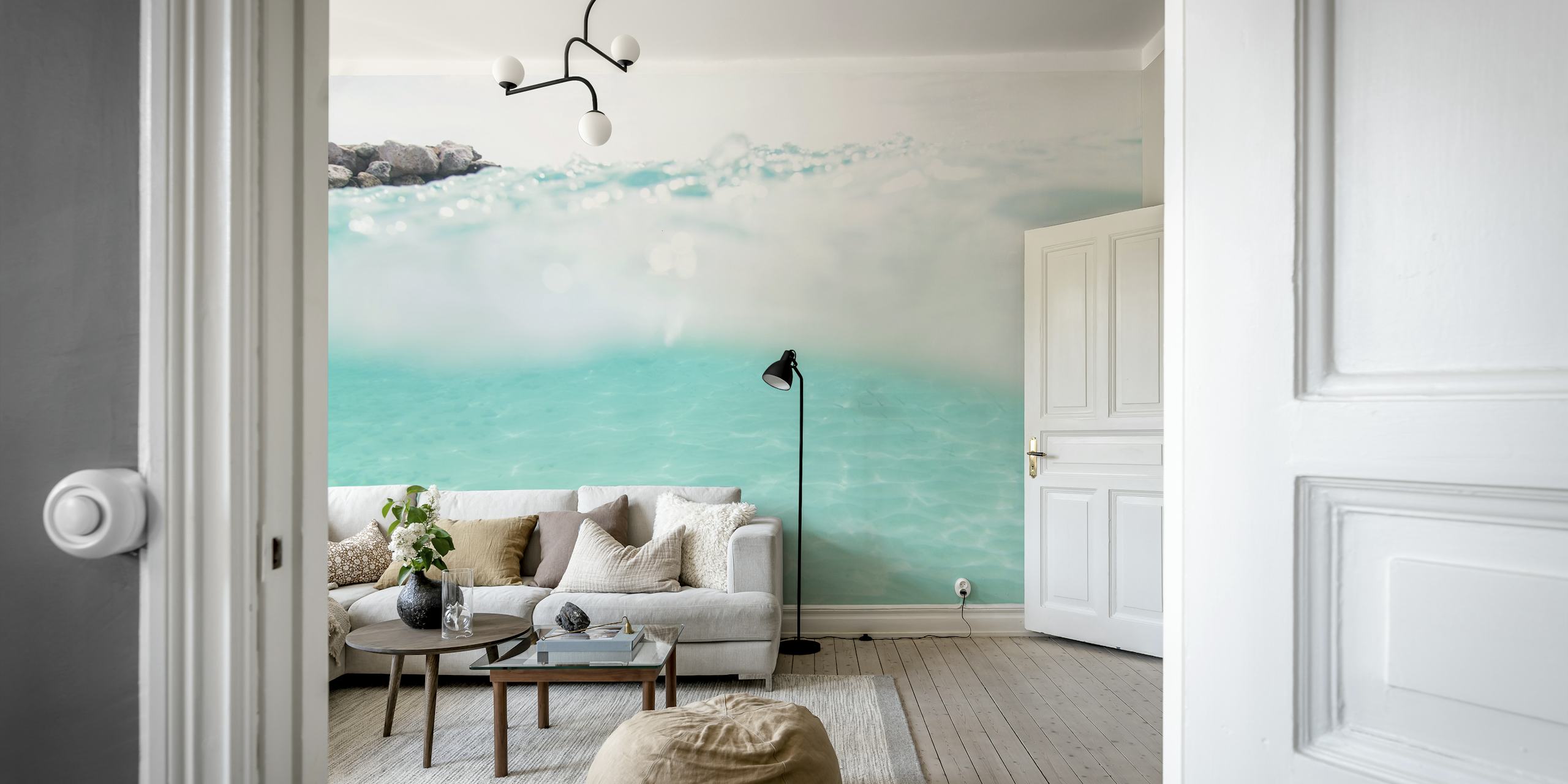 Turquoise water with gentle ripples and light reflection wallpaper