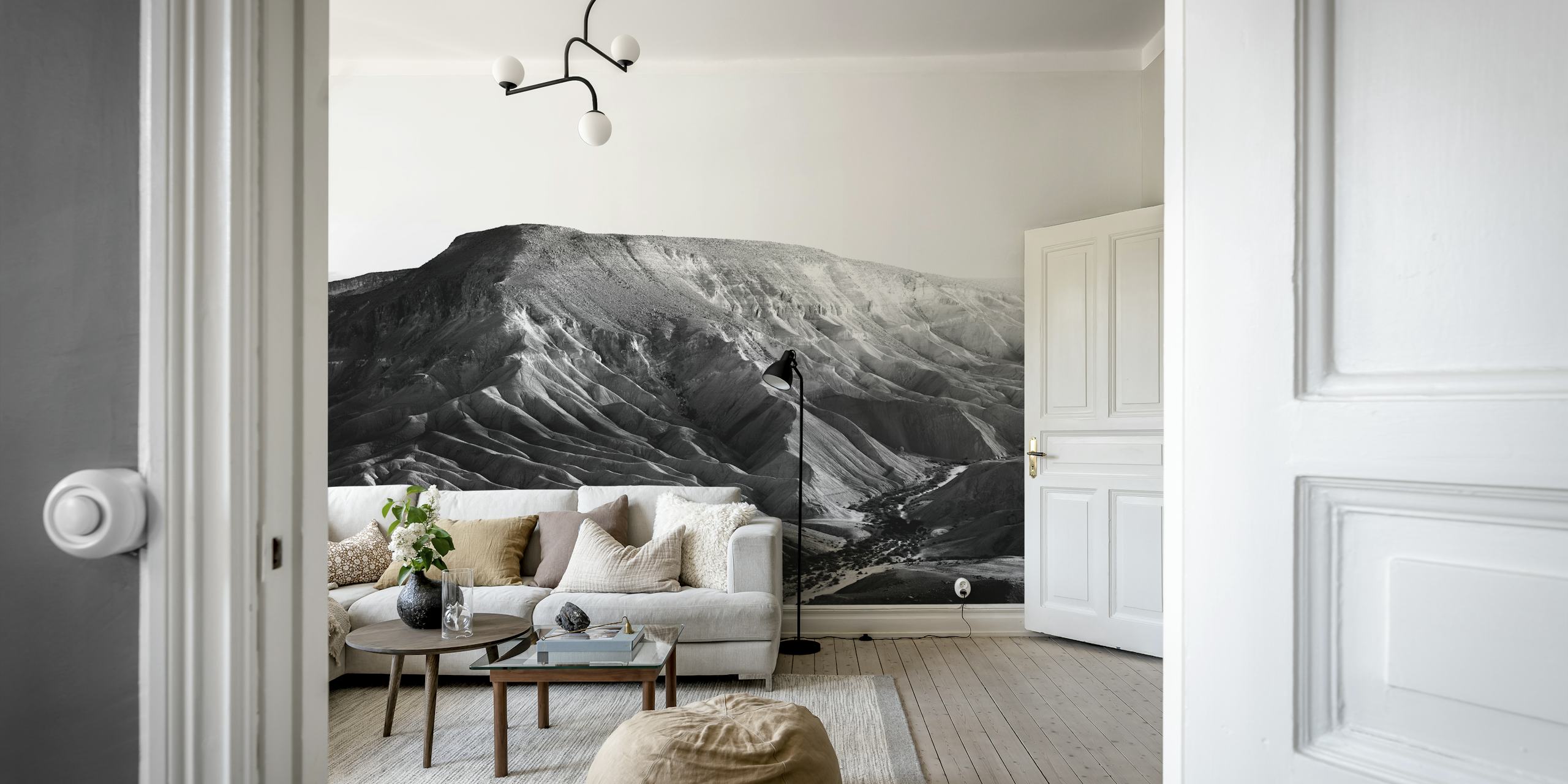 Black and white mountain landscape wallpaper depicting rugged terrain and valleys.