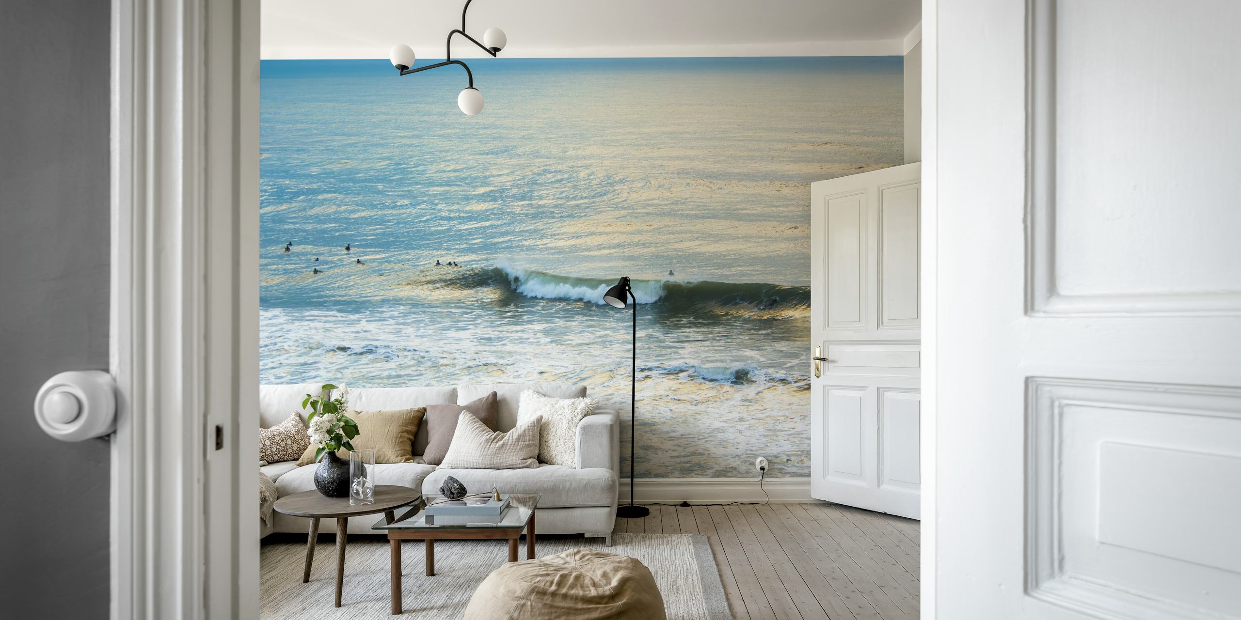 Ocean waves and surfers in blue tones wallpaper