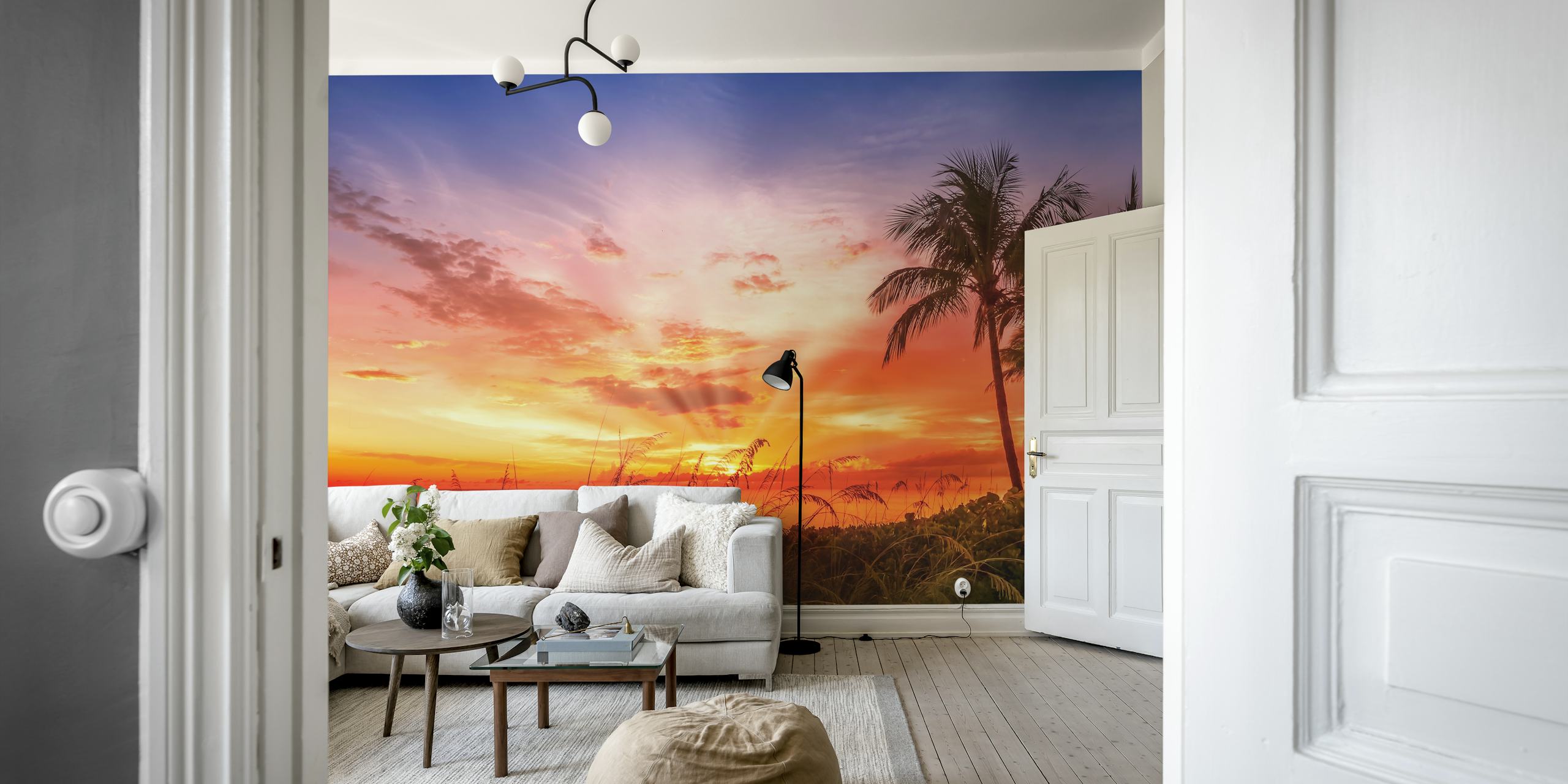 Tropical sunset over the beach with palm trees wallpaper