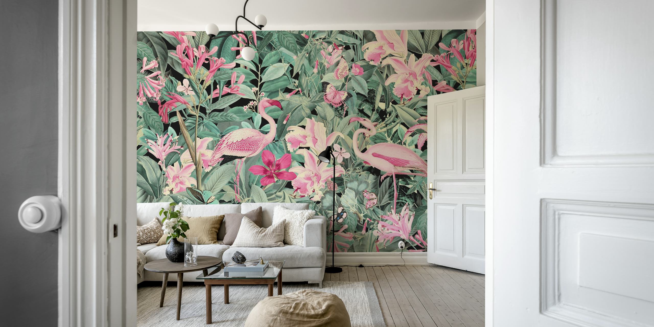 Pink flamingos among lush green leaves and flowers wallpaper