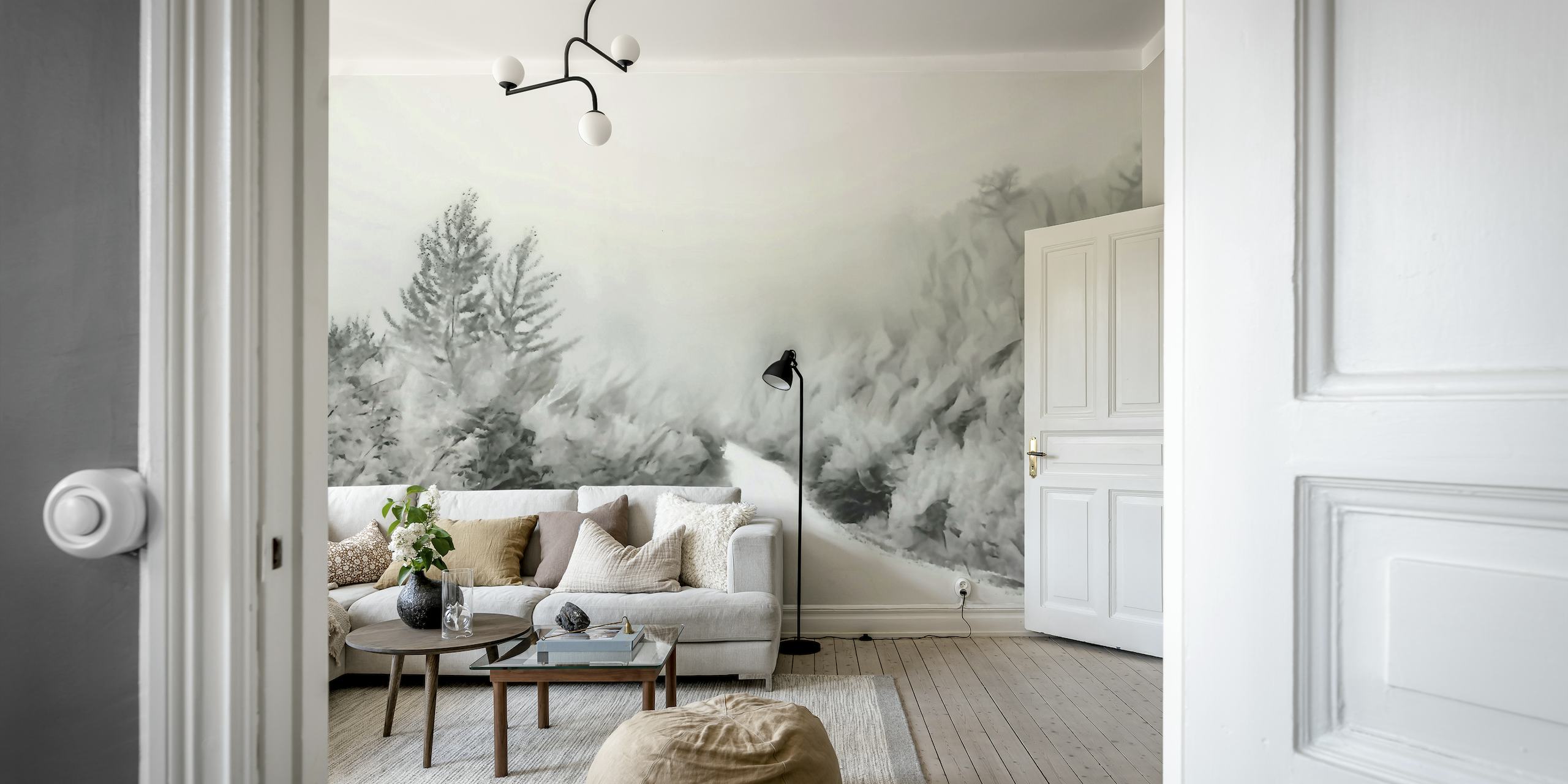 Monochrome misty forest path wall mural with snow-covered trees