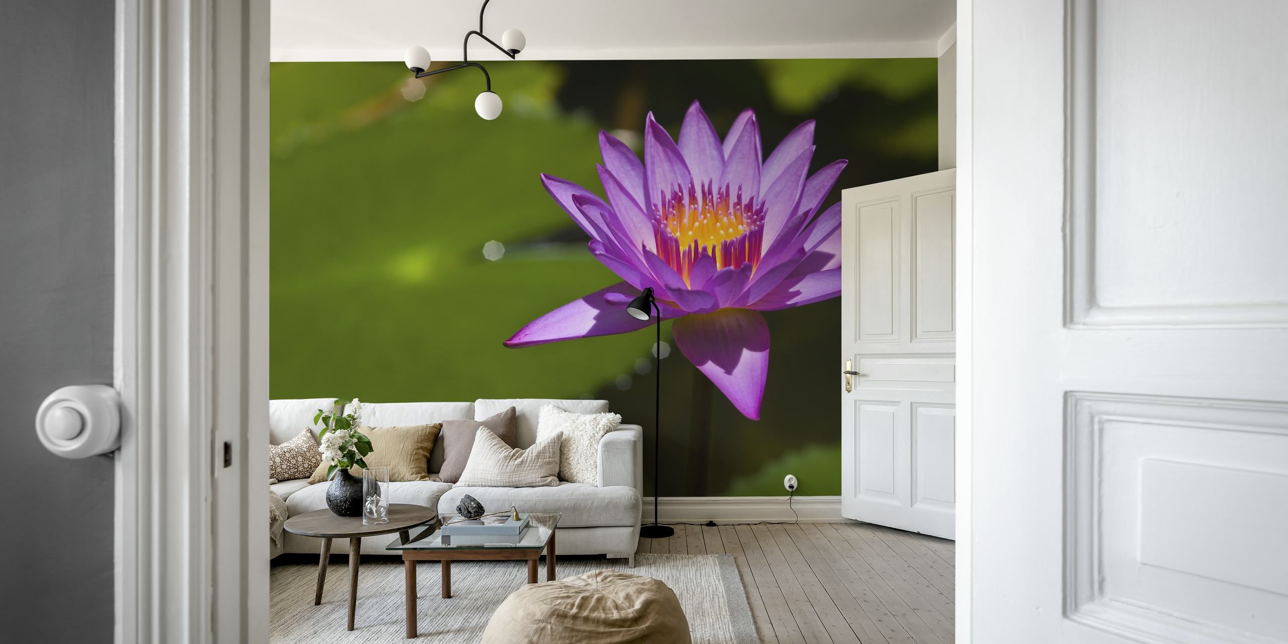 Purple lotus flower with green leaves wallpaper