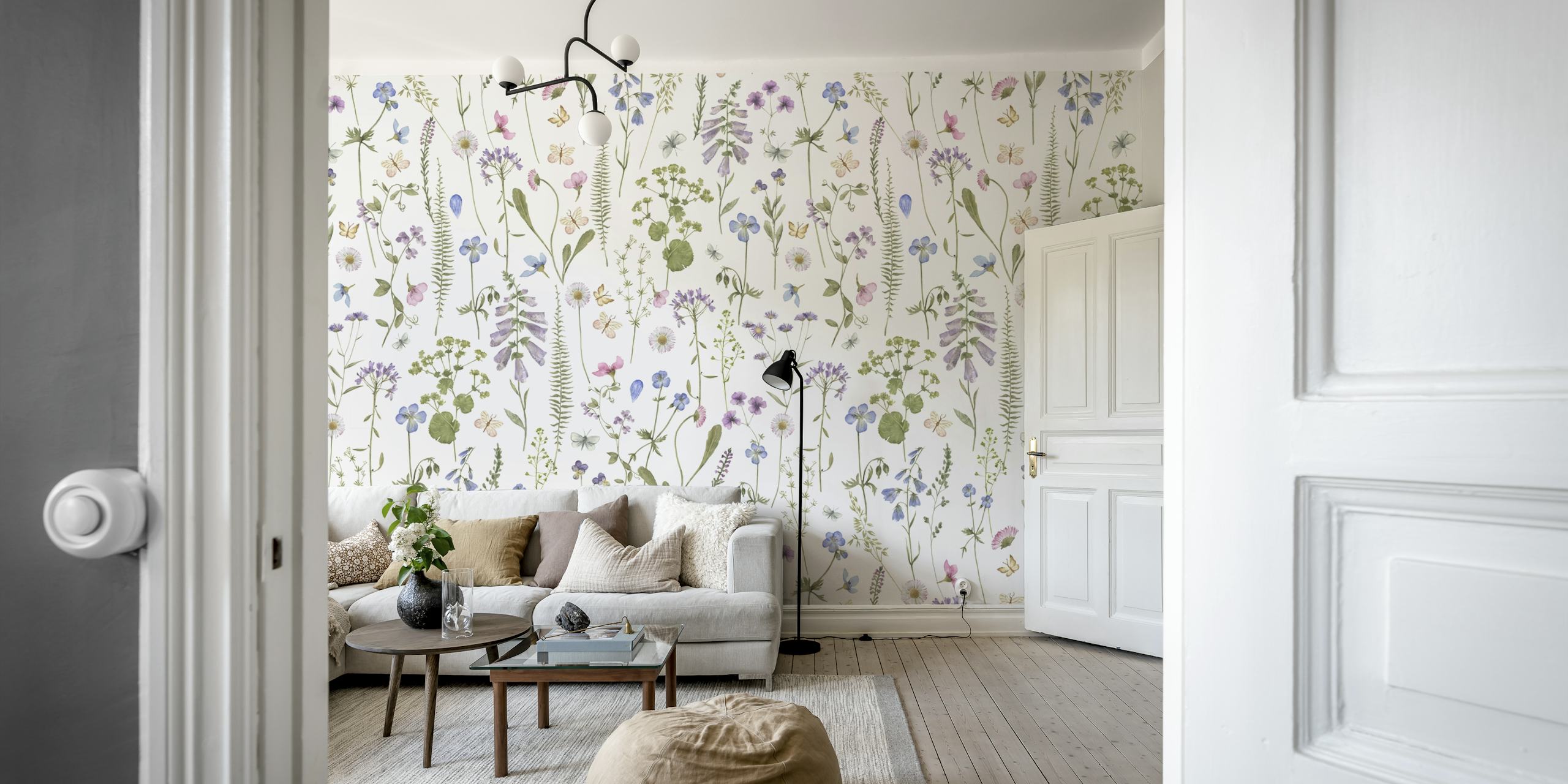 Various colorful wildflowers and green leaves on a white background wallpaper