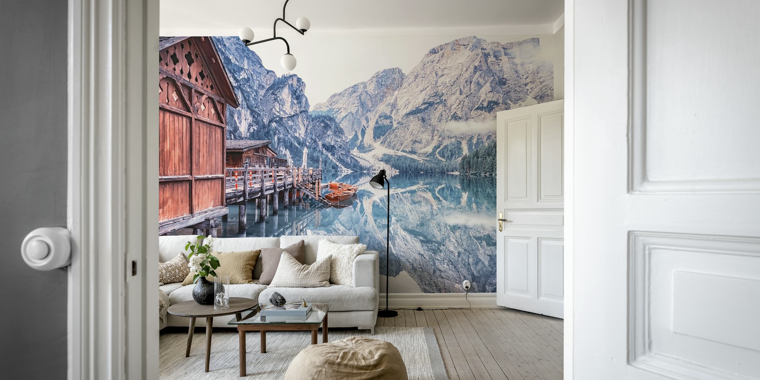 Mountain lake reflection with wooden cabin and boats wallpaper