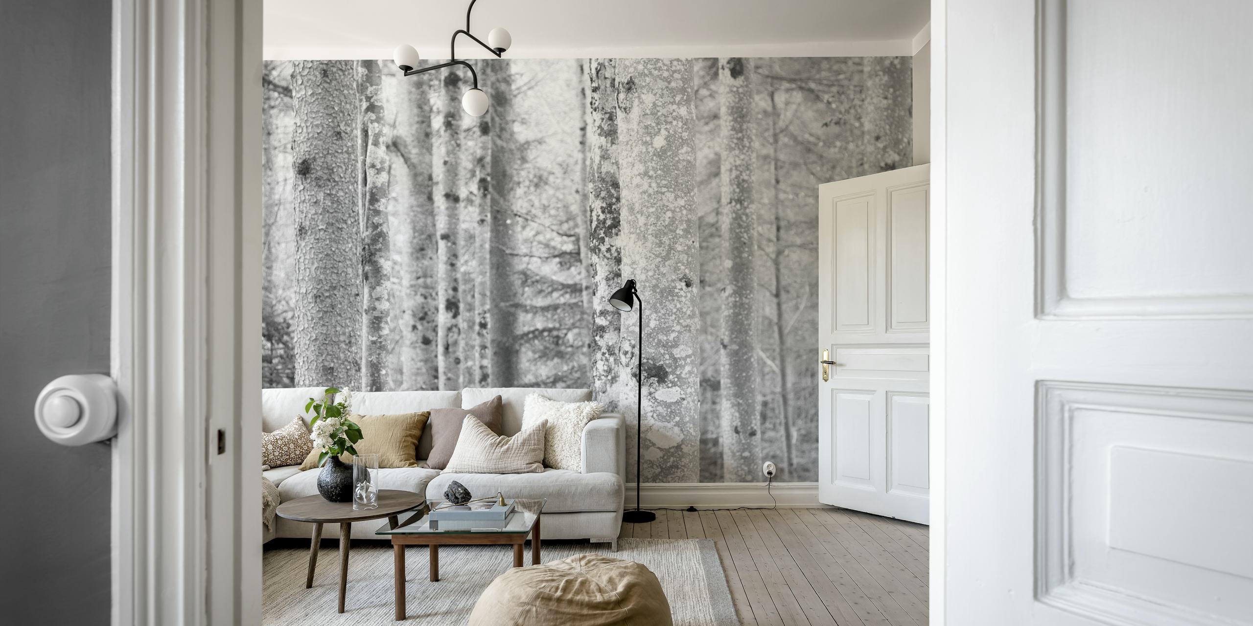 Black and white wall mural depicting a serene forest scene with mist-enshrouded trees.