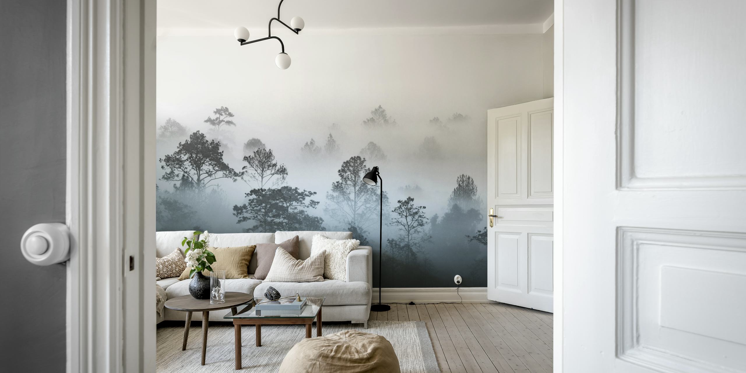 Misty forest wall mural with a gradient of fog descending through trees