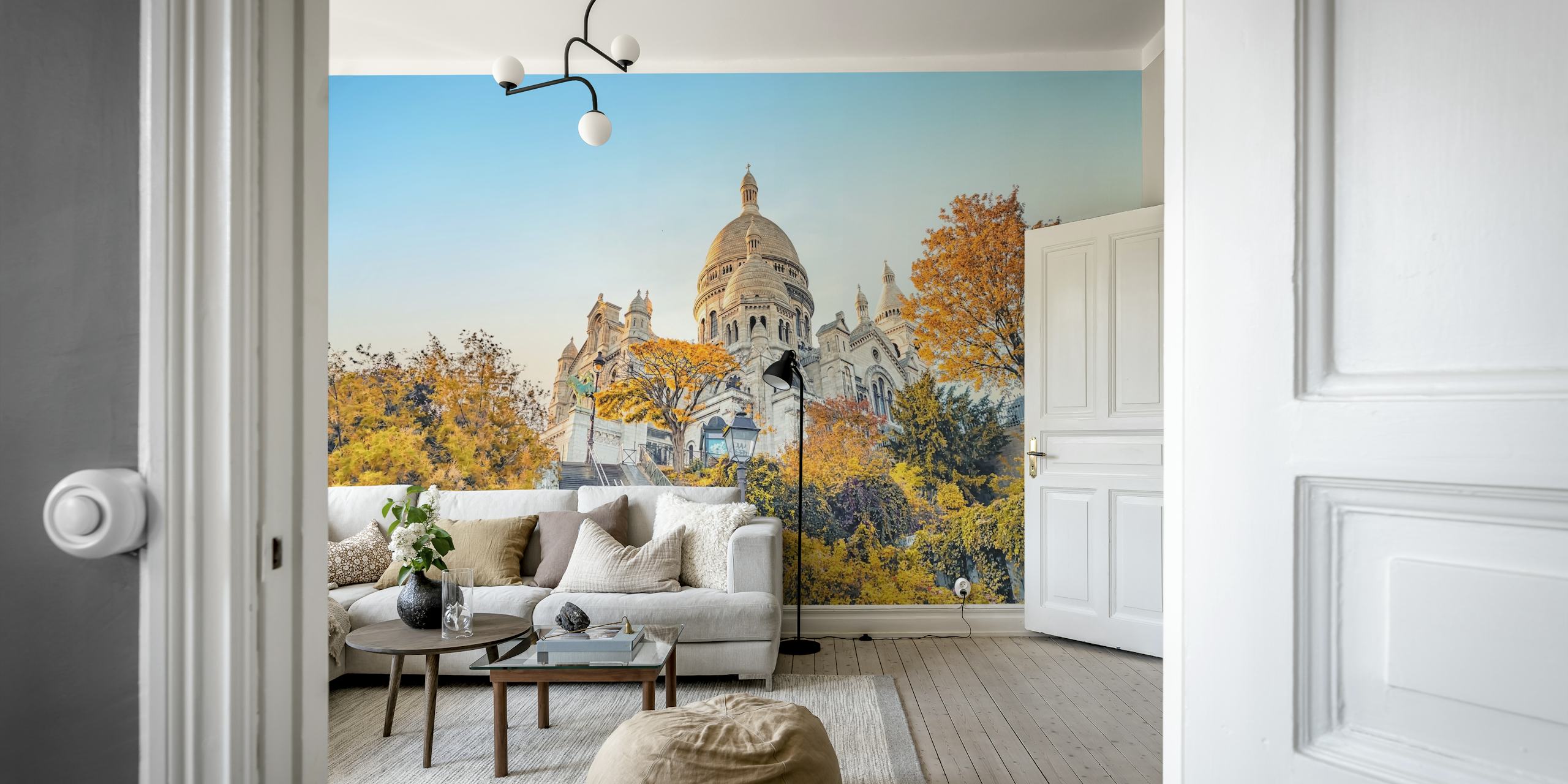 Montmartre autumn scene with golden trees and a cathedral wall mural