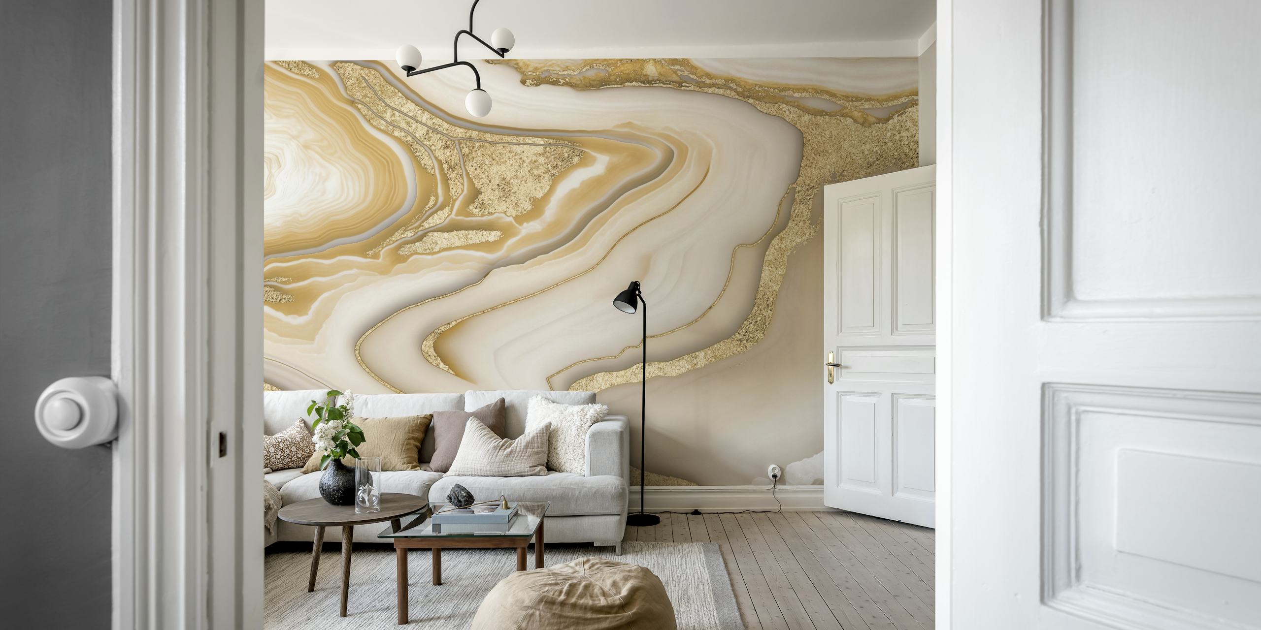 White and gold marble wallpaper with flowing patterns.