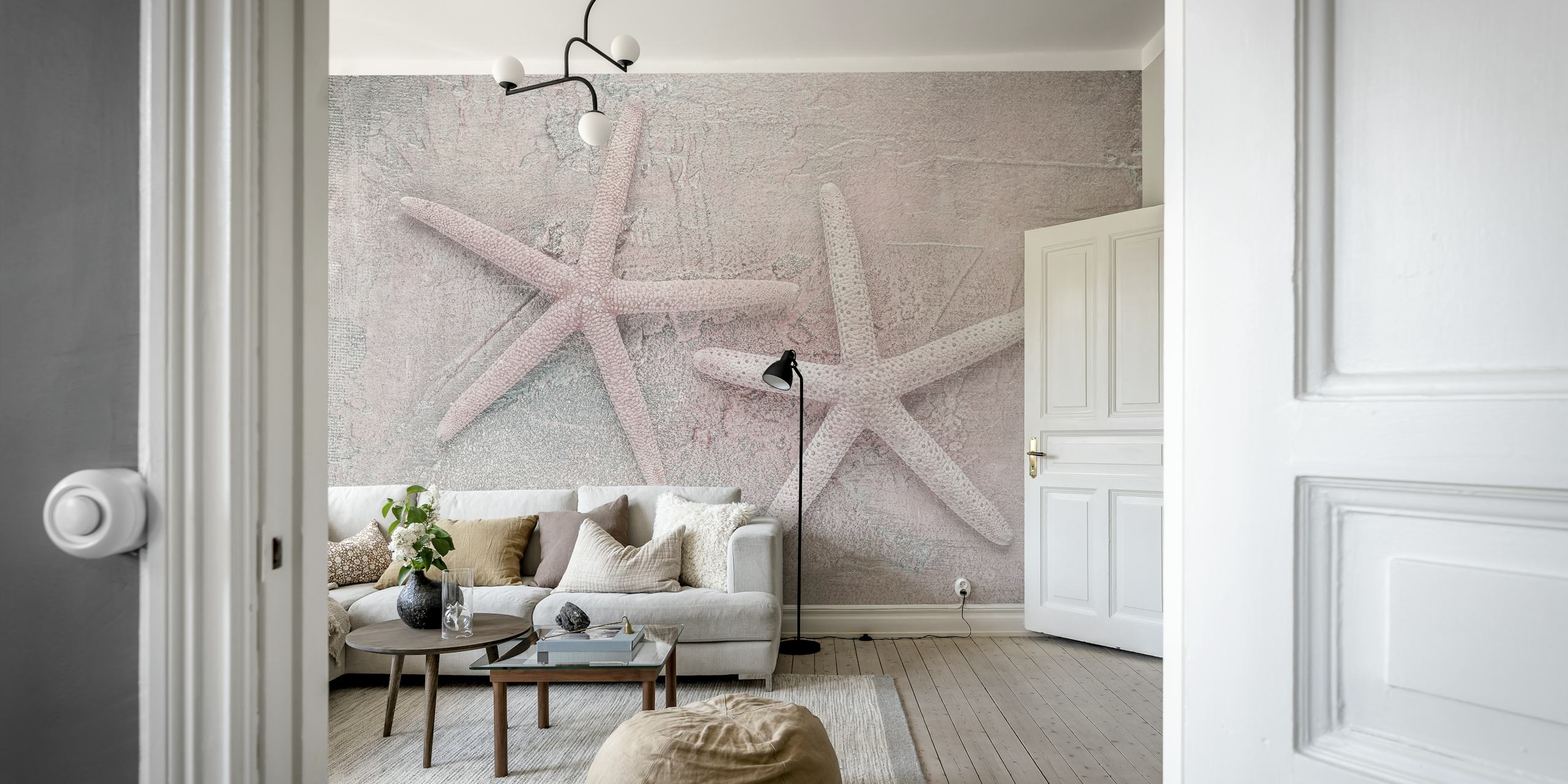 Mural de parede Blush Pink Starfish com duas estrelas do mar em um fundo texturizado