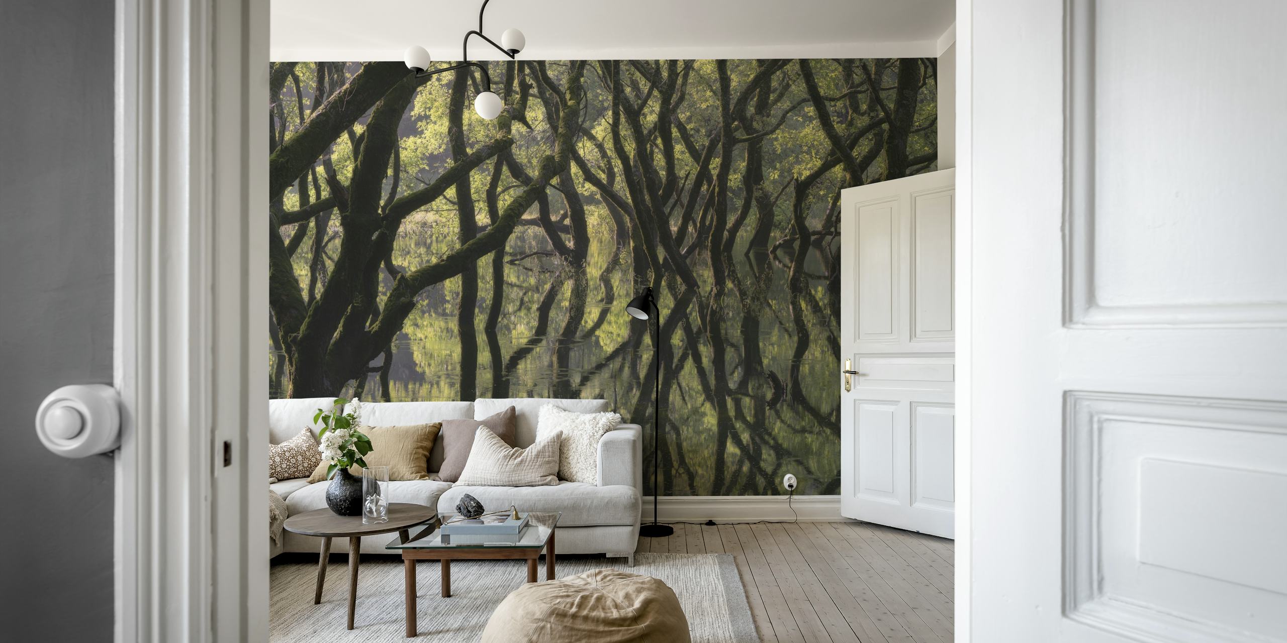 Tree silhouettes and reflections on water with green tones wallpaper