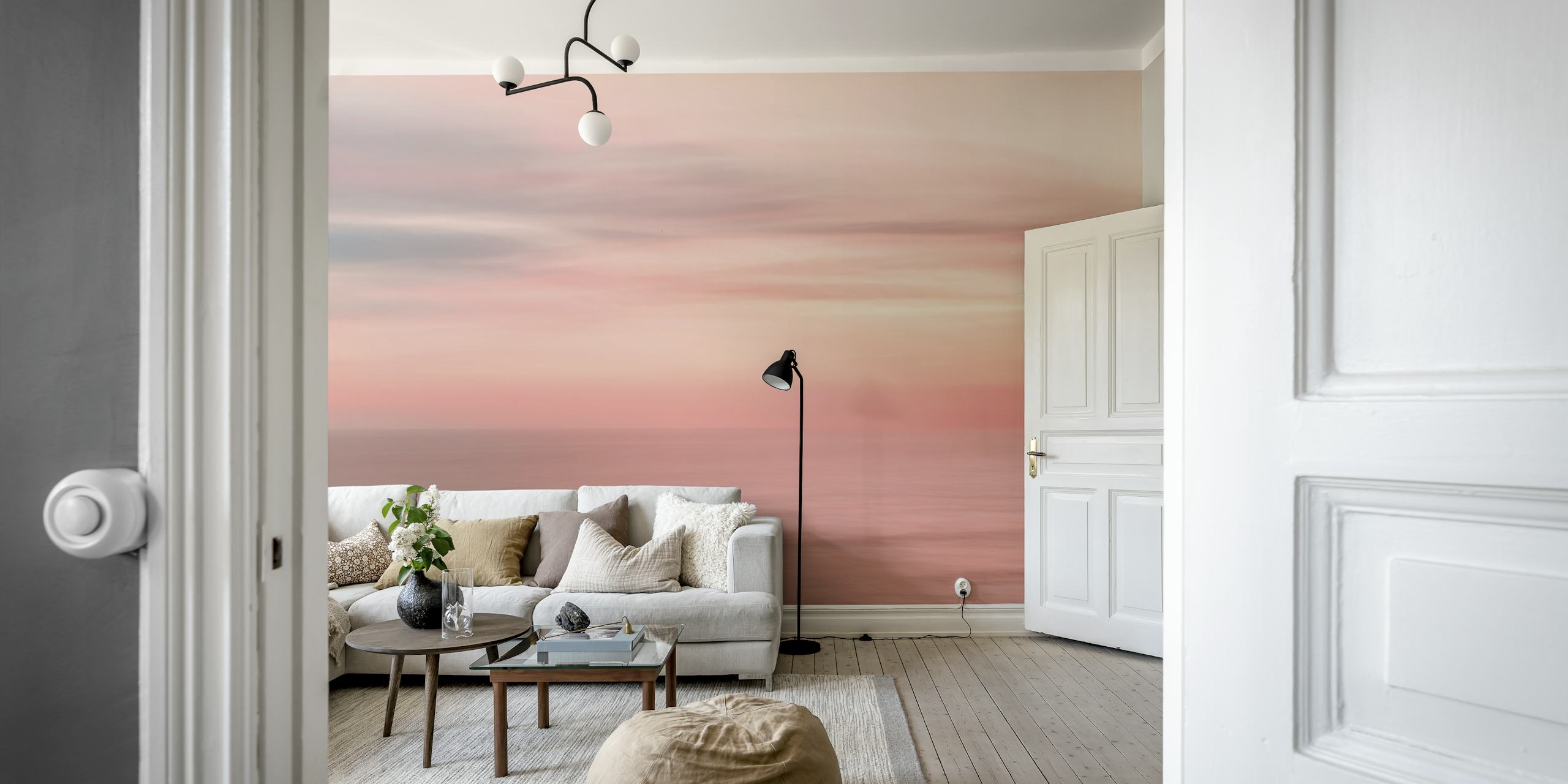 Mural de parede de um céu colorido do pôr do sol com tons rosa e laranja refletindo no oceano