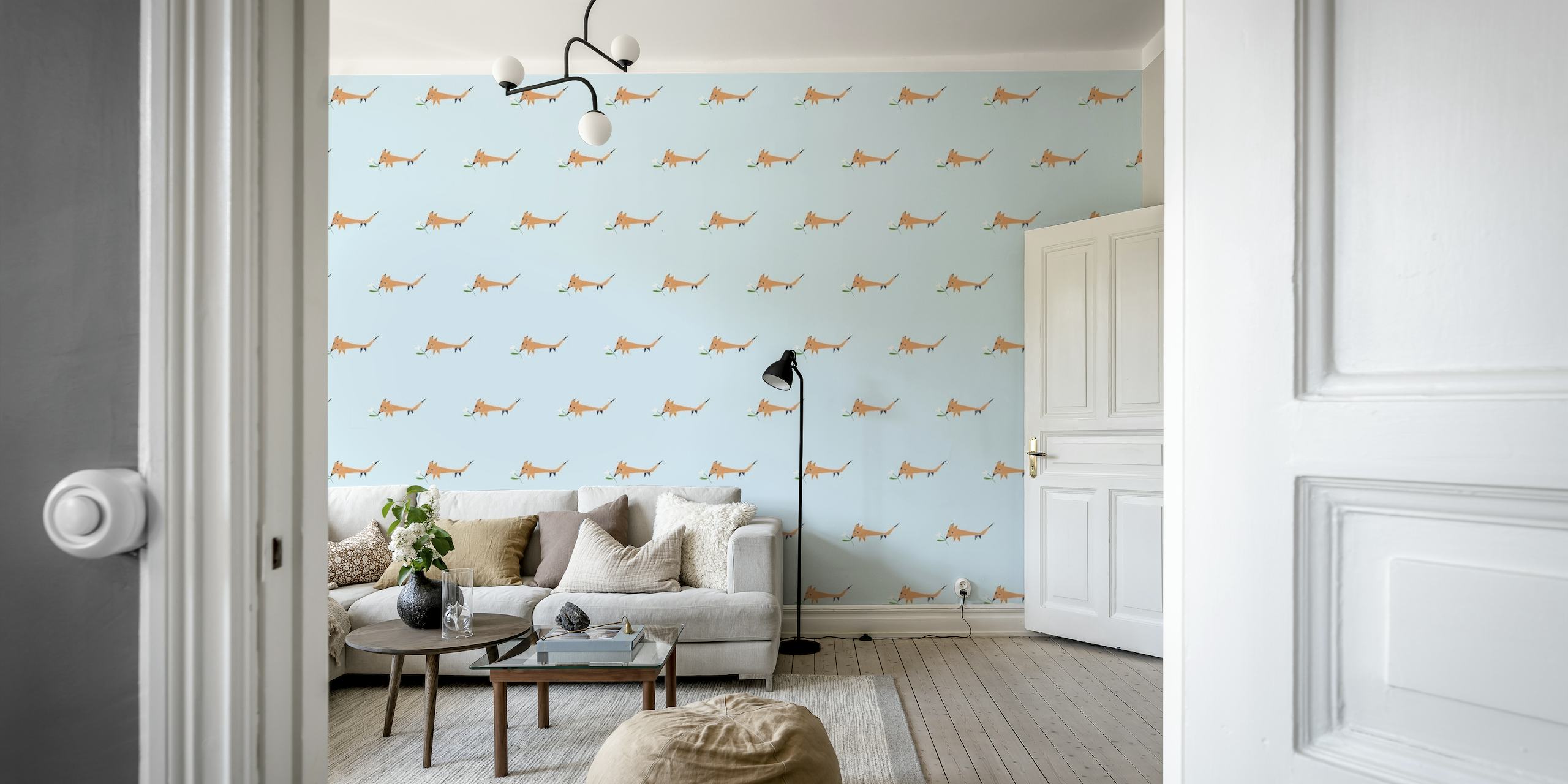 Little foxes wall mural with orange foxes on a pale blue background