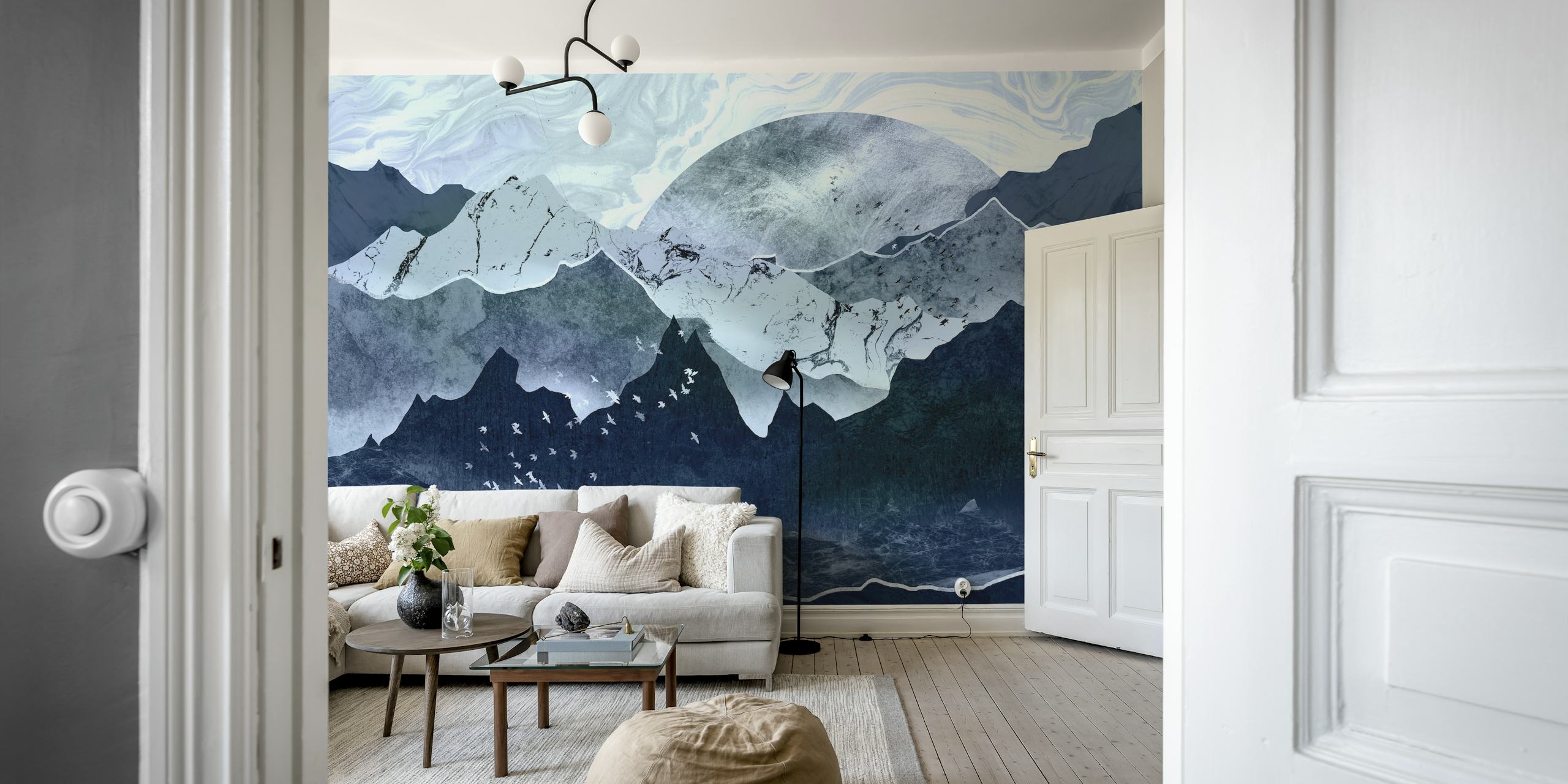 Blue mountains with white birds flying above wallpaper