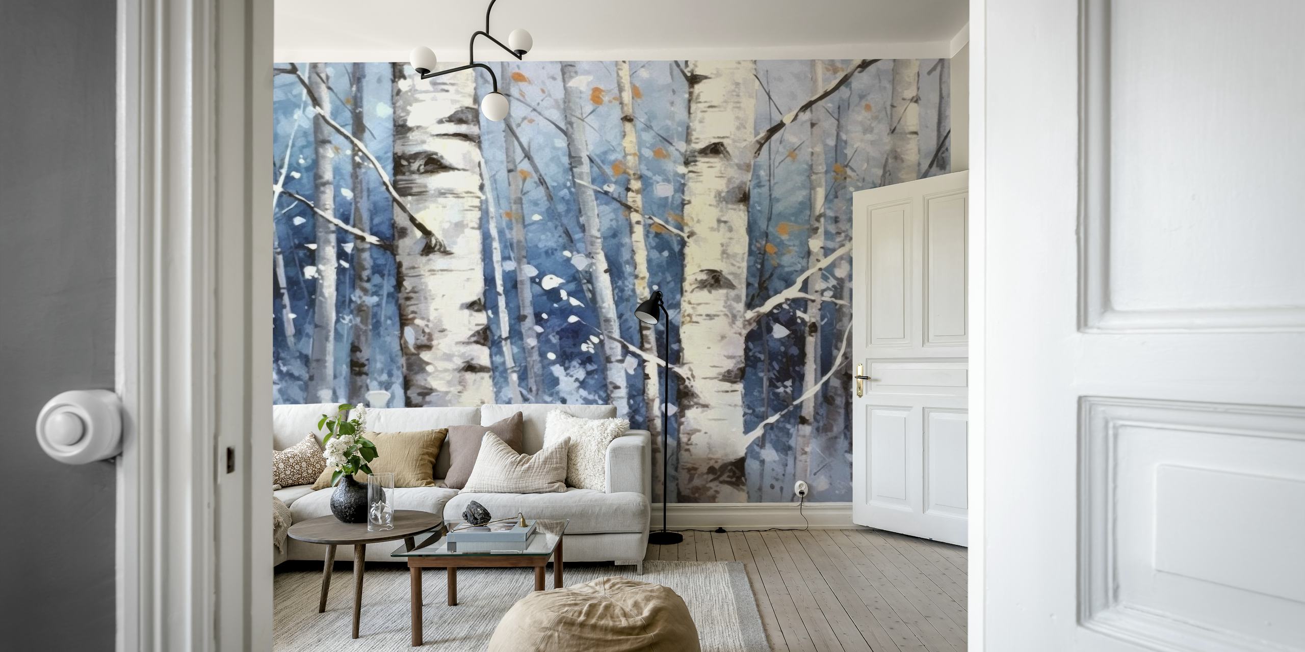 Snowy birch forest wallpaper displayed in a room