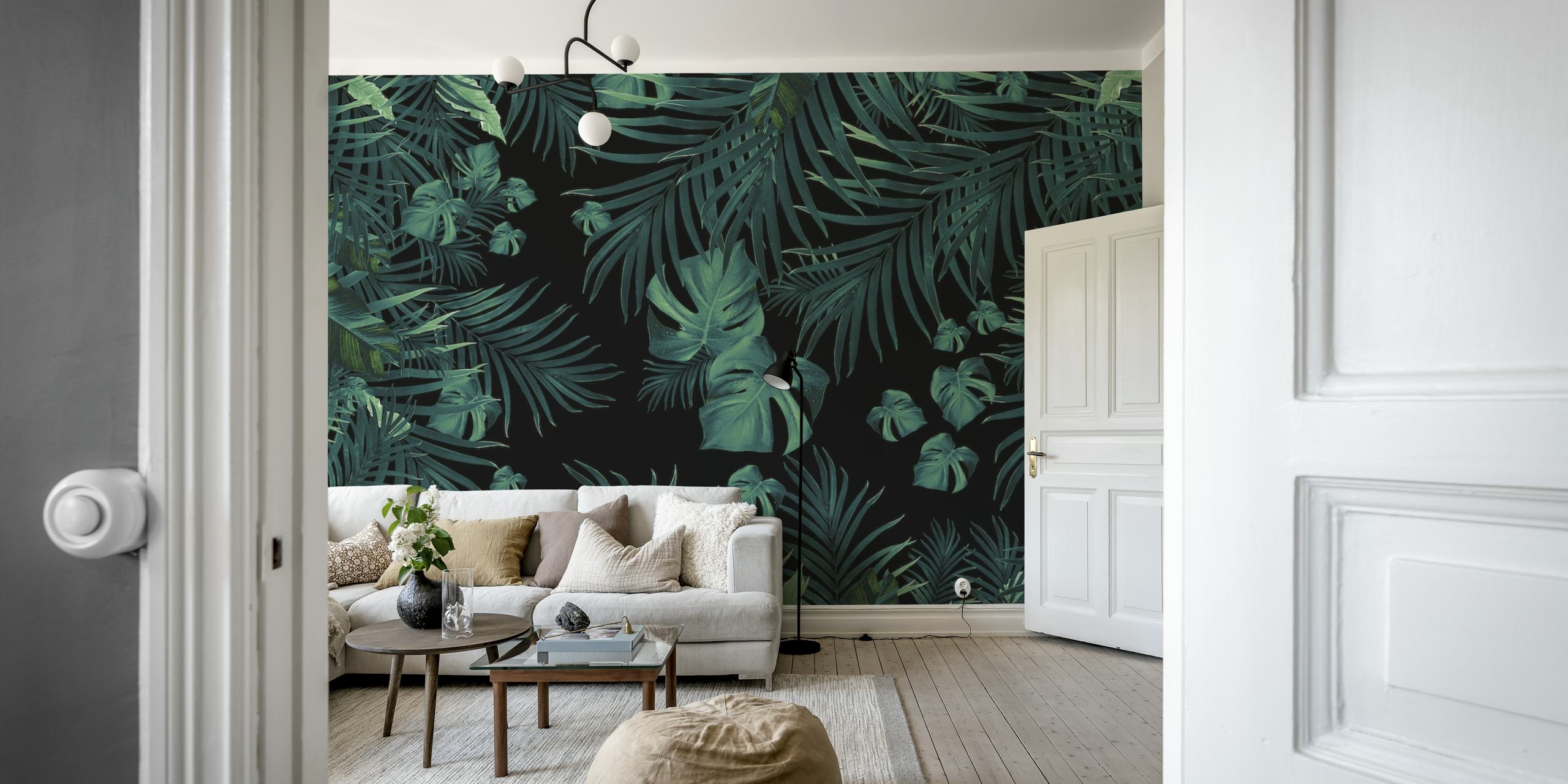Lush tropical leaves wall mural in dark green hues for a night jungle ambience.