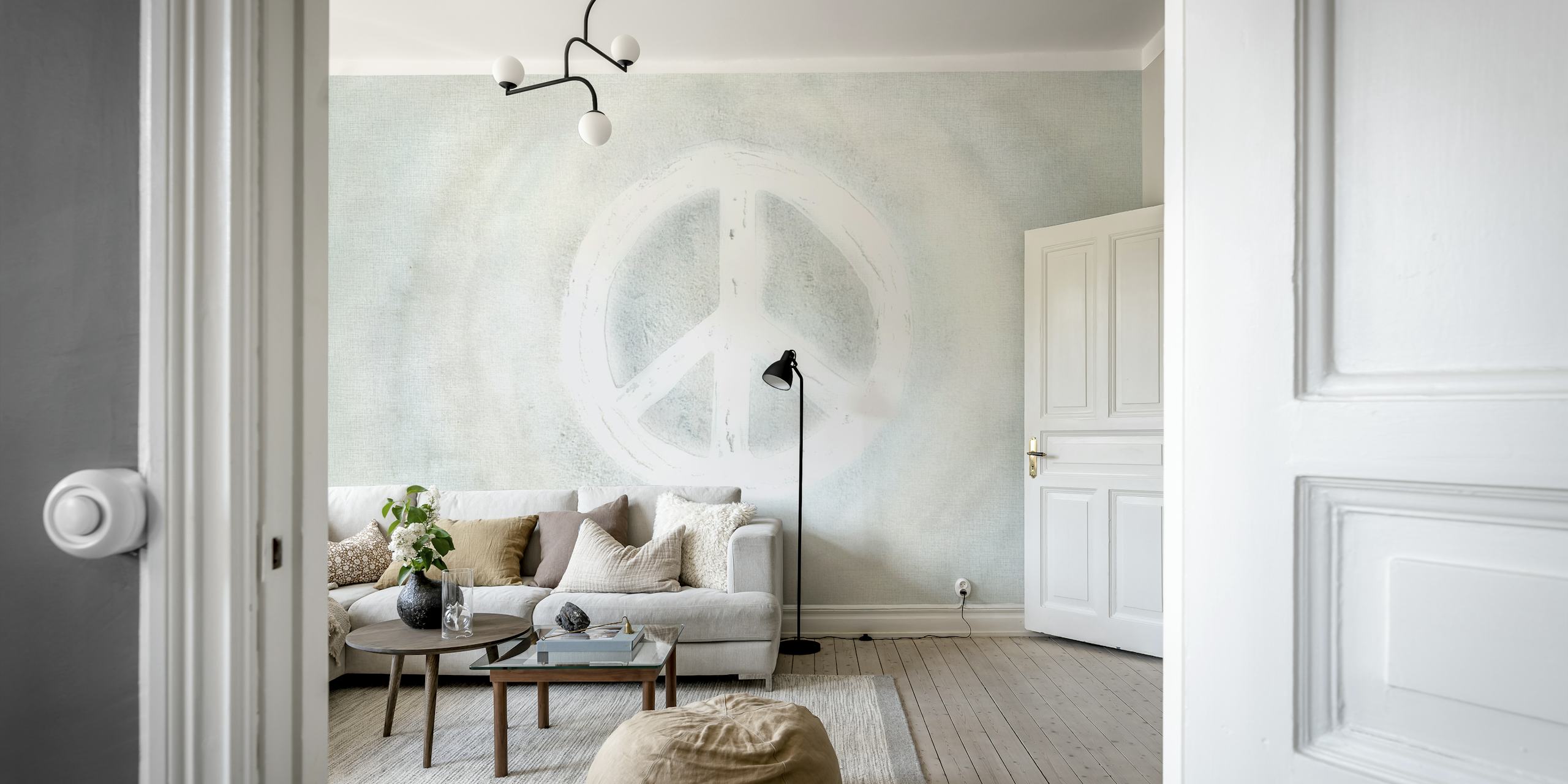 Sinal de paz em aquarela pintado em tons suaves de cinza em um mural de parede