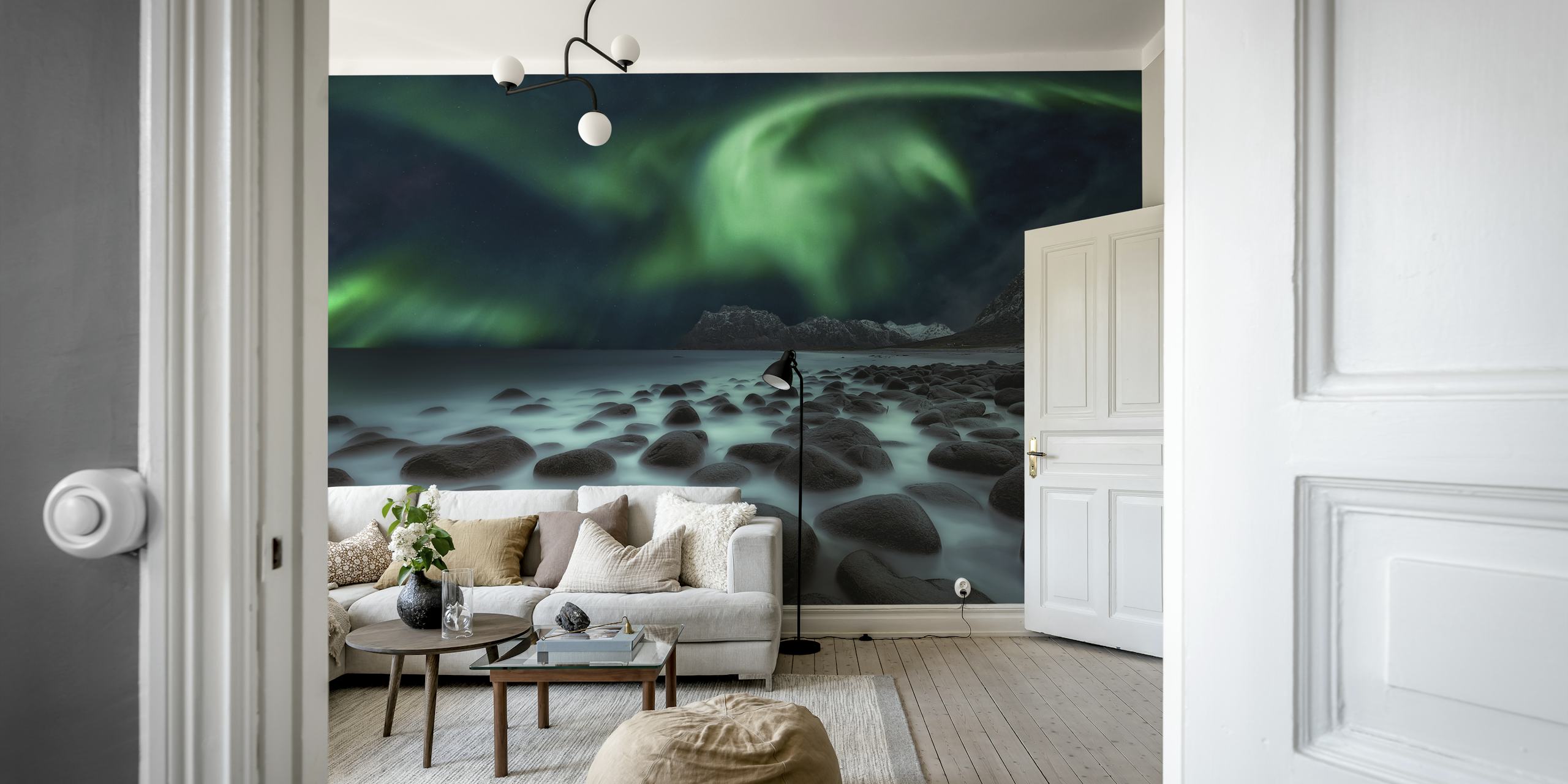 Aurora Borealis over rocky beach landscape wallpaper