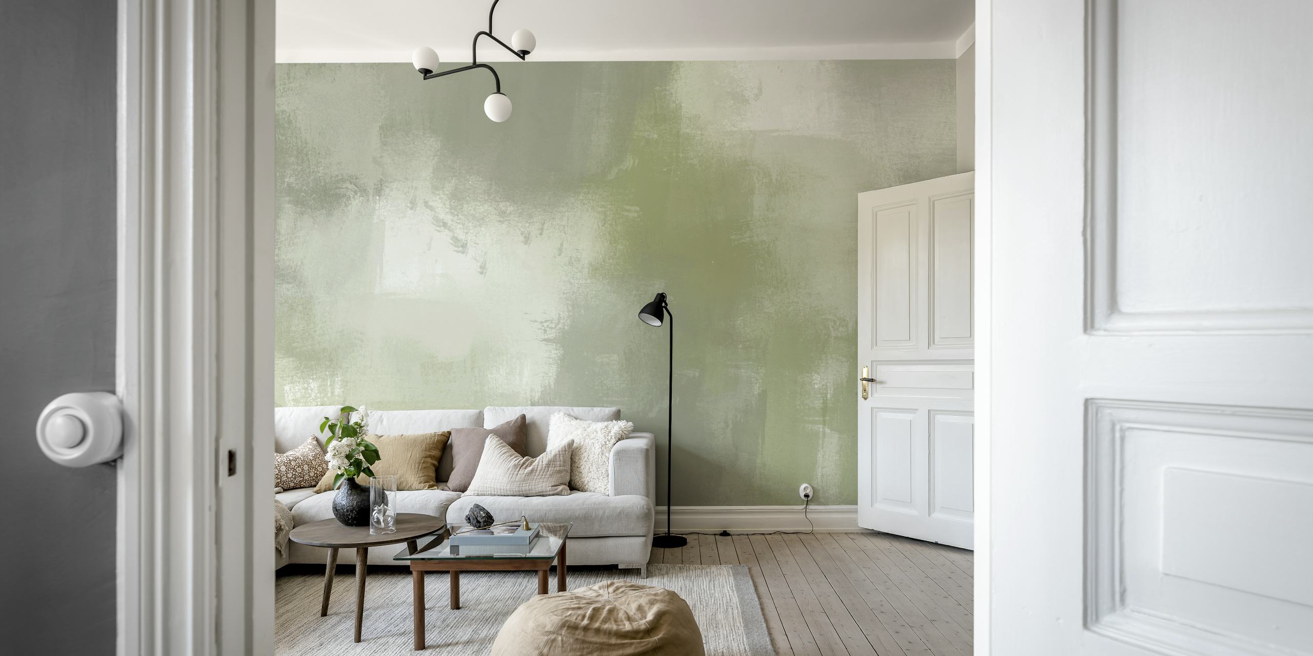 Abstract brush strokes in muted green and white wallpaper