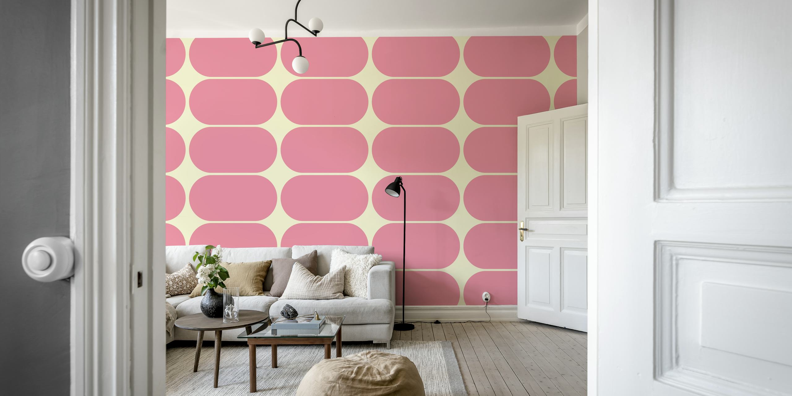 Geometric pebble shapes in pink and cream wallpaper