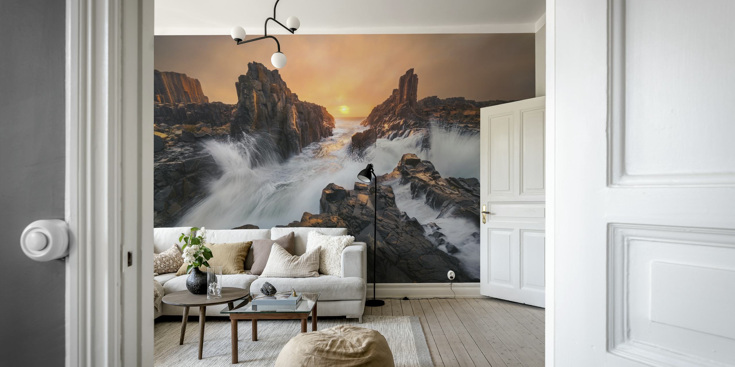 Coastal sunset with dynamic waves and rocky cliffs wallpaper