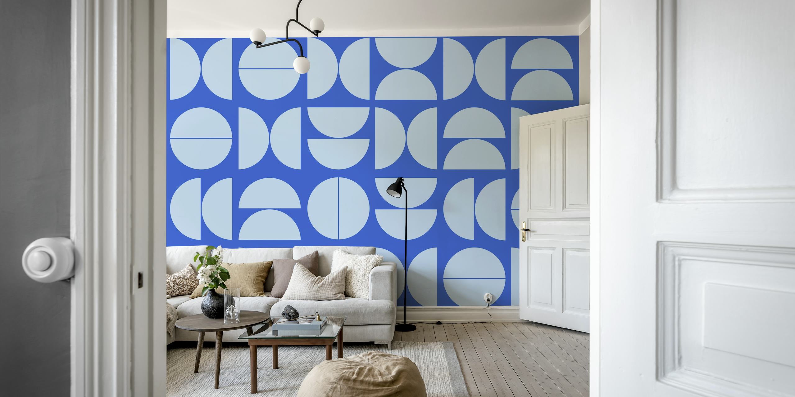 Modern blue geometric wallpaper in a room