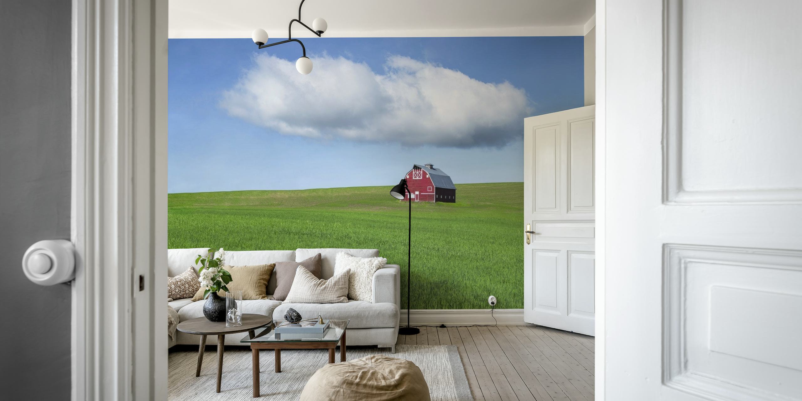 Lone red barn in a green field under a clear blue sky wall mural