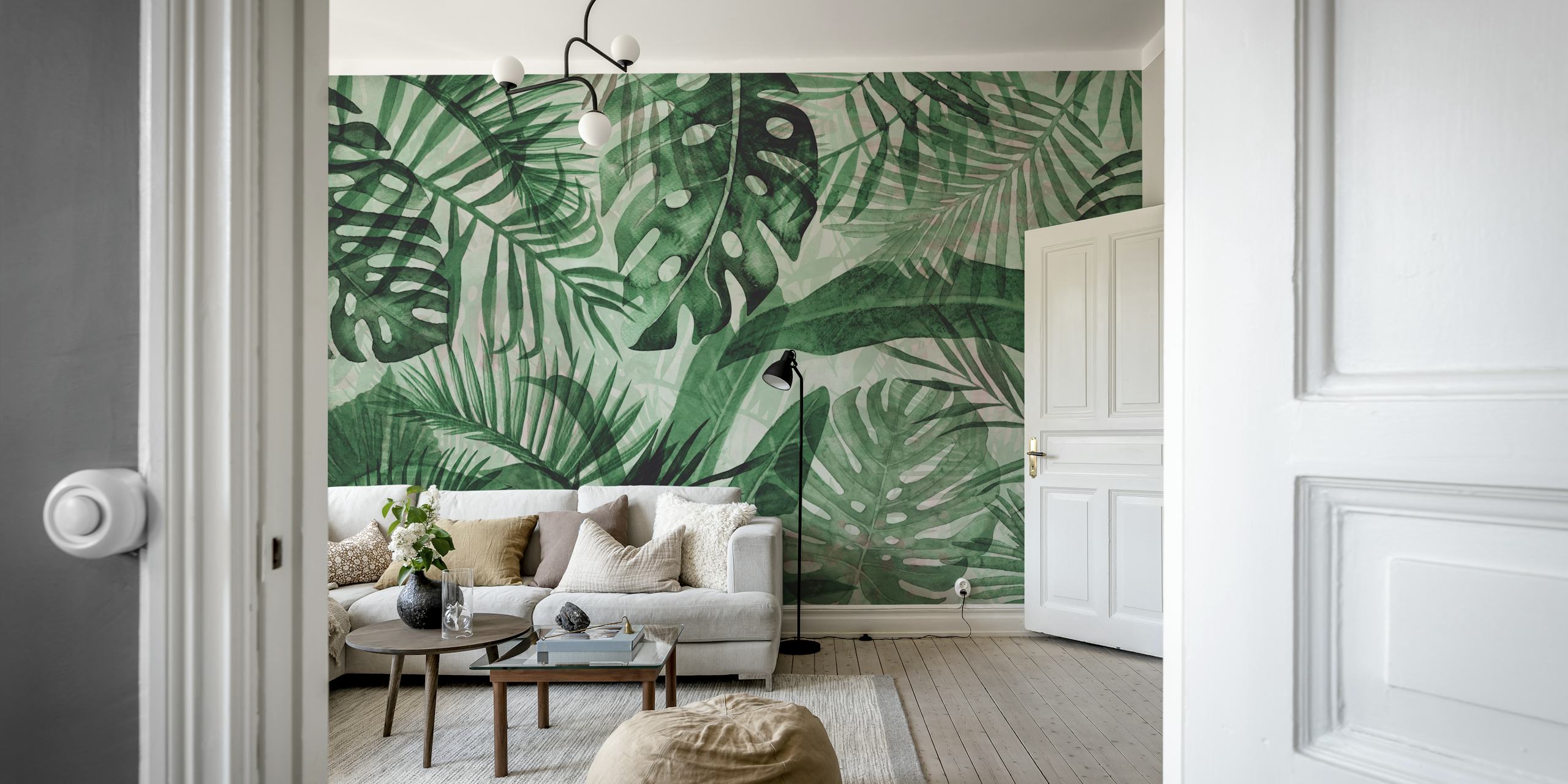 Tropical Monstera palm leaves in green shades wallpaper