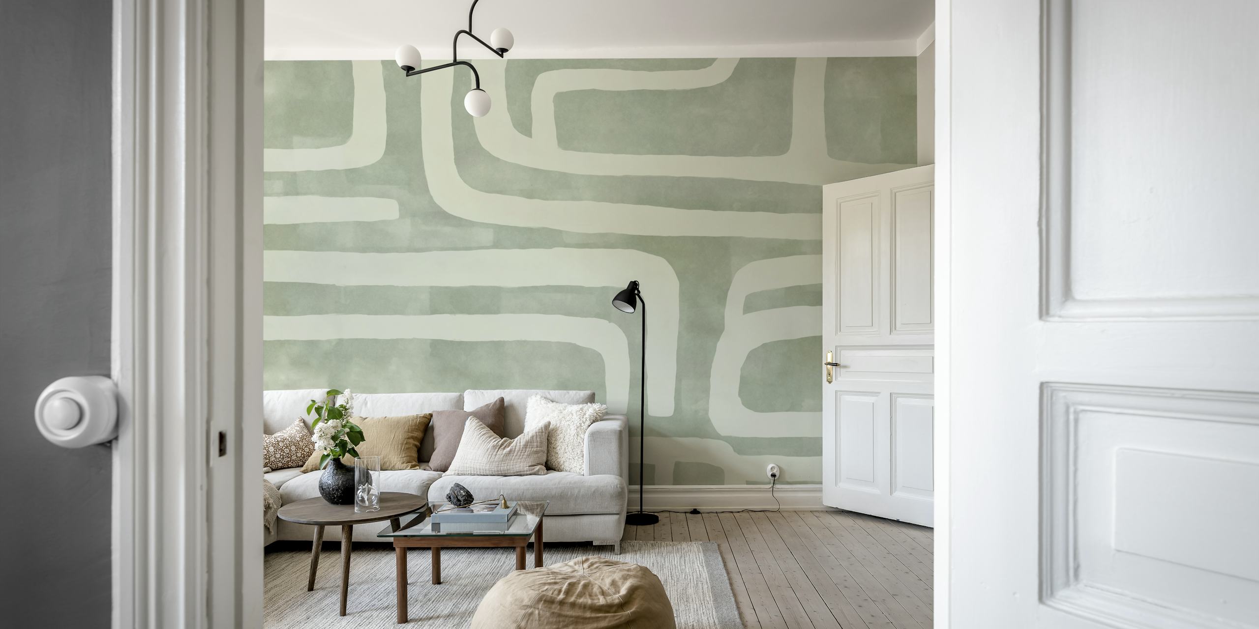 Tribal Shapes Abstract Art Sage Green Tapete in einem Raum.