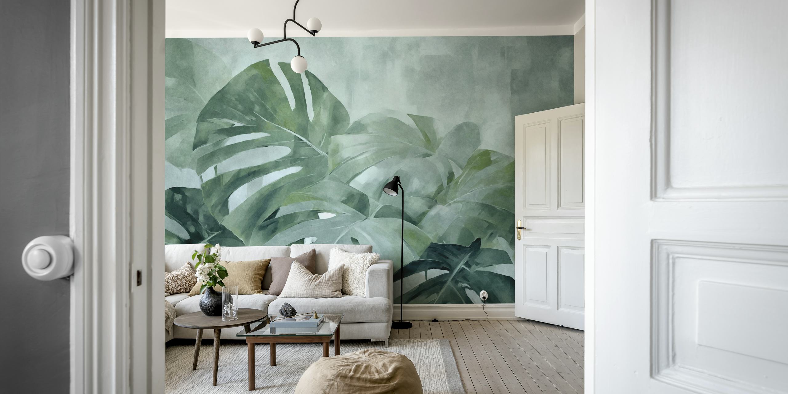 Blågrønne monstera-blader på veggmaleri for en rolig interiørdekor