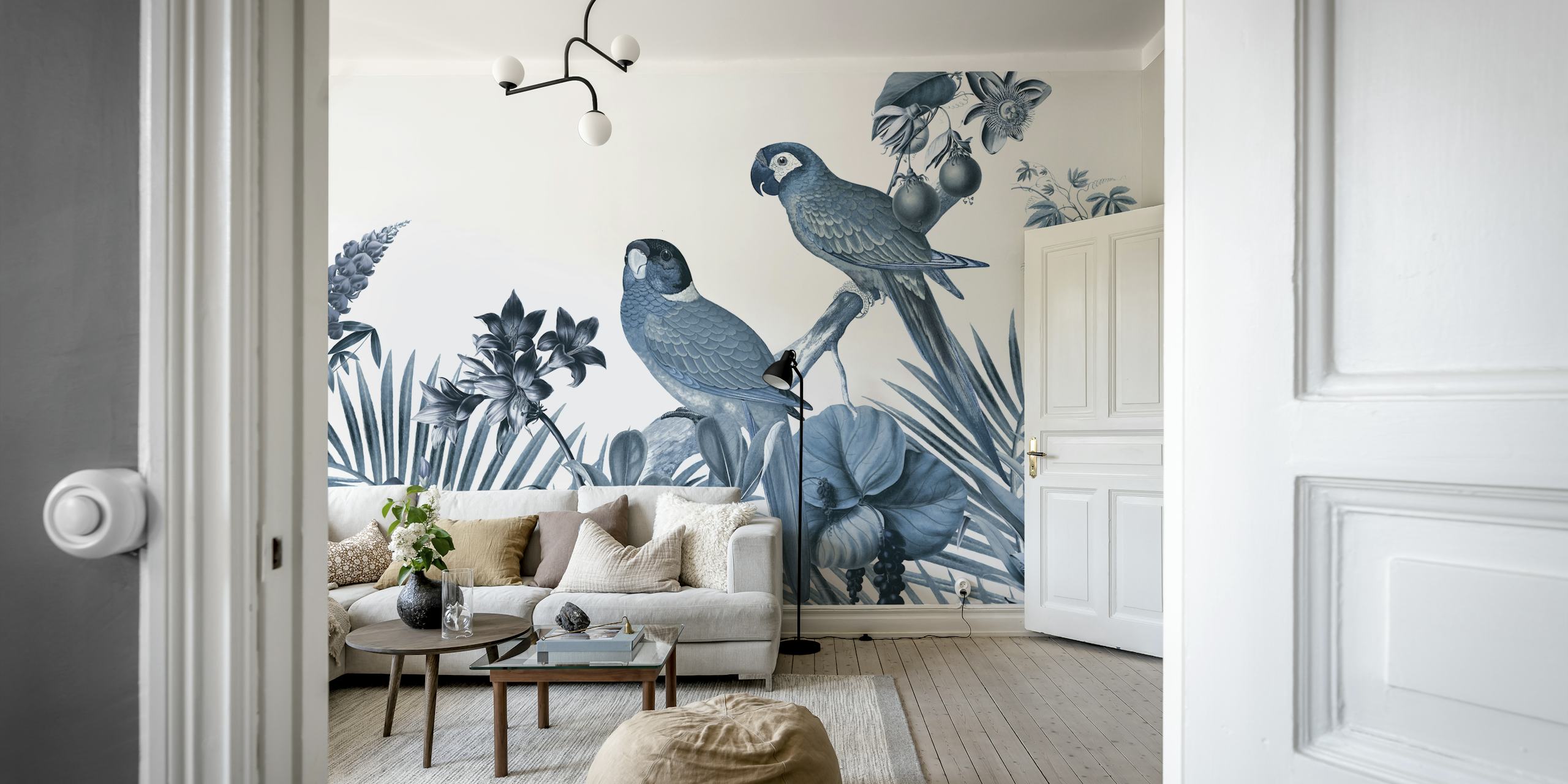 Two blue tropical parrot birds surrounded by floral patterns wallpaper