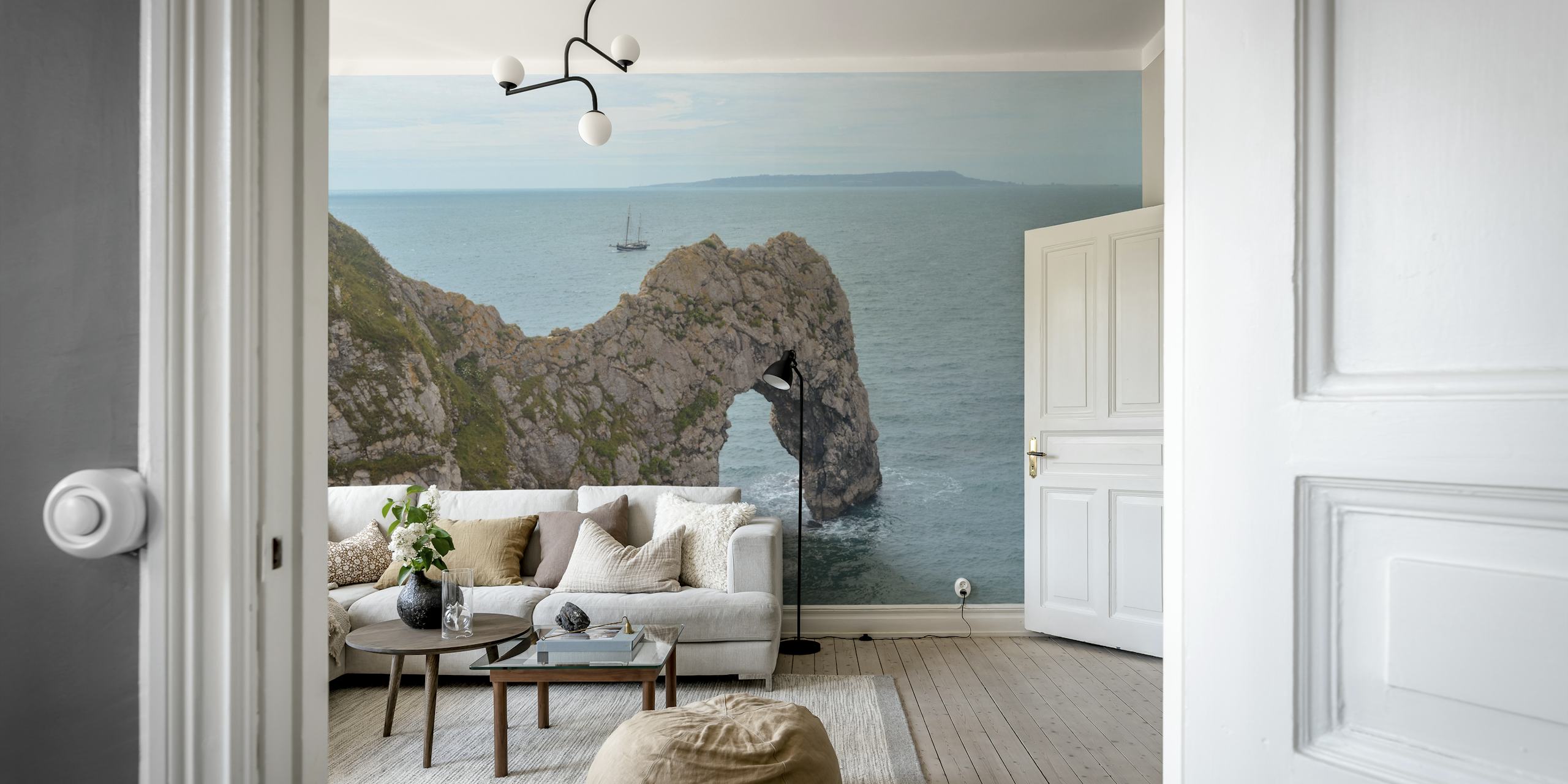 Coastal view wallpaper featuring Durdle Door rock arch and blue waters.