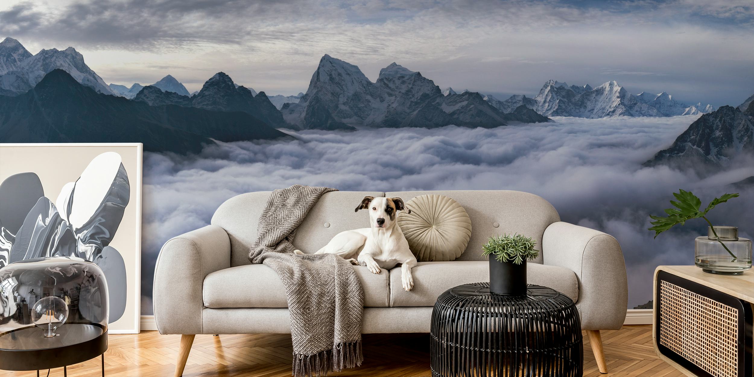 Misty clouds flowing through a mountain range in a wall mural