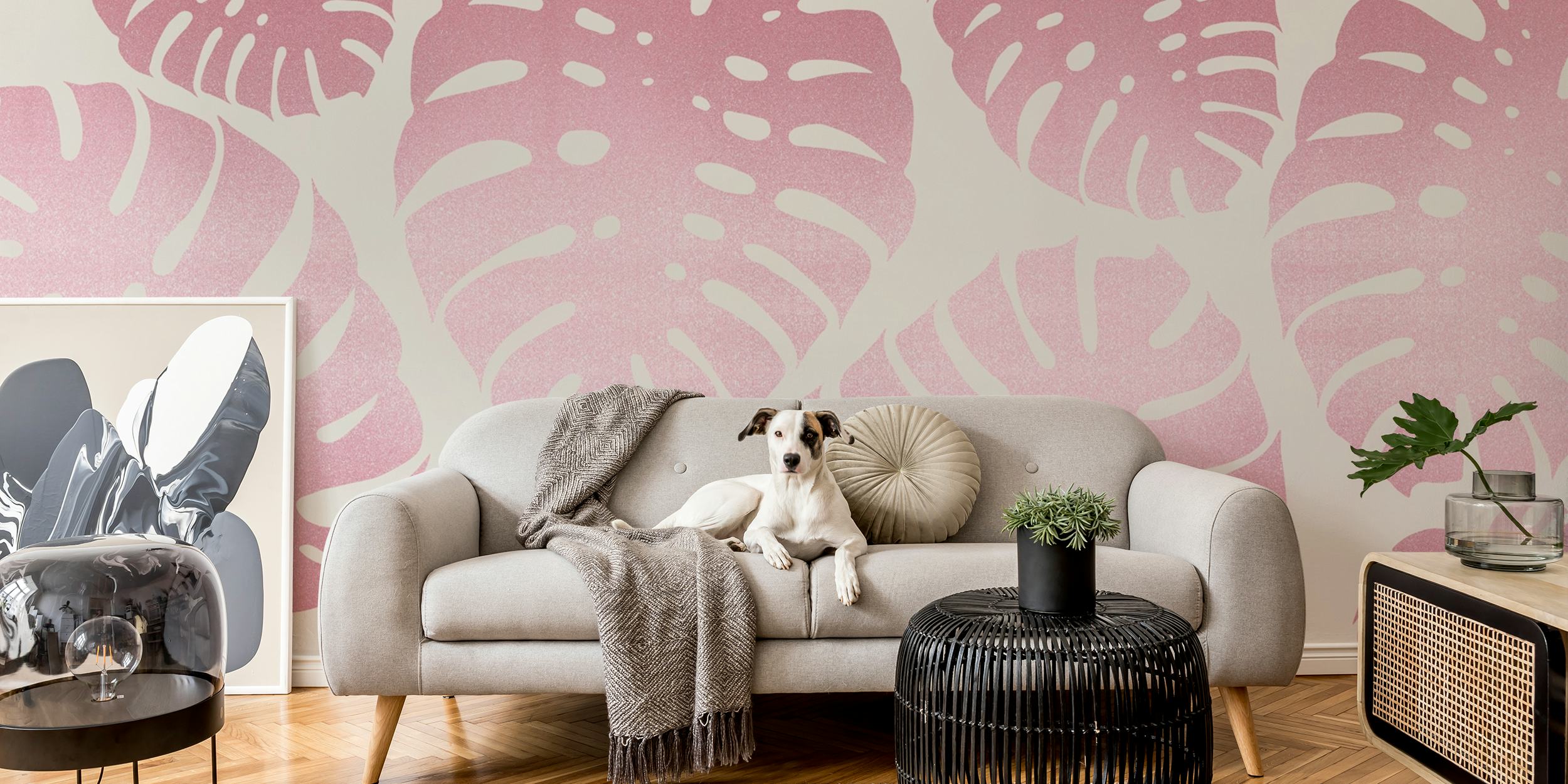 Large pink monstera leaves on a light background wallpaper