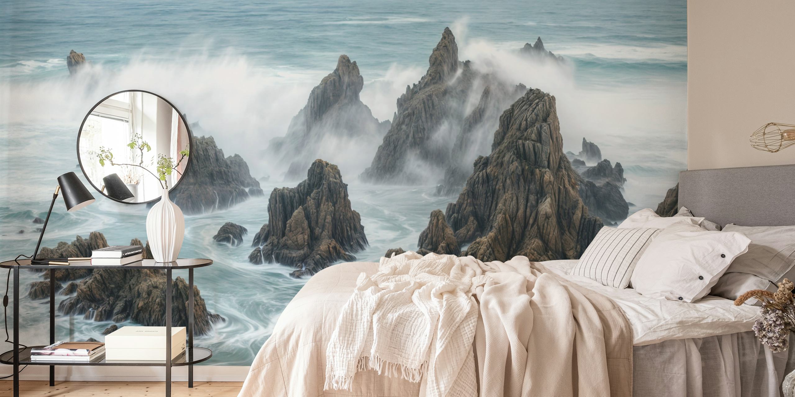 Rocky seascape with blue waves and mist wallpaper