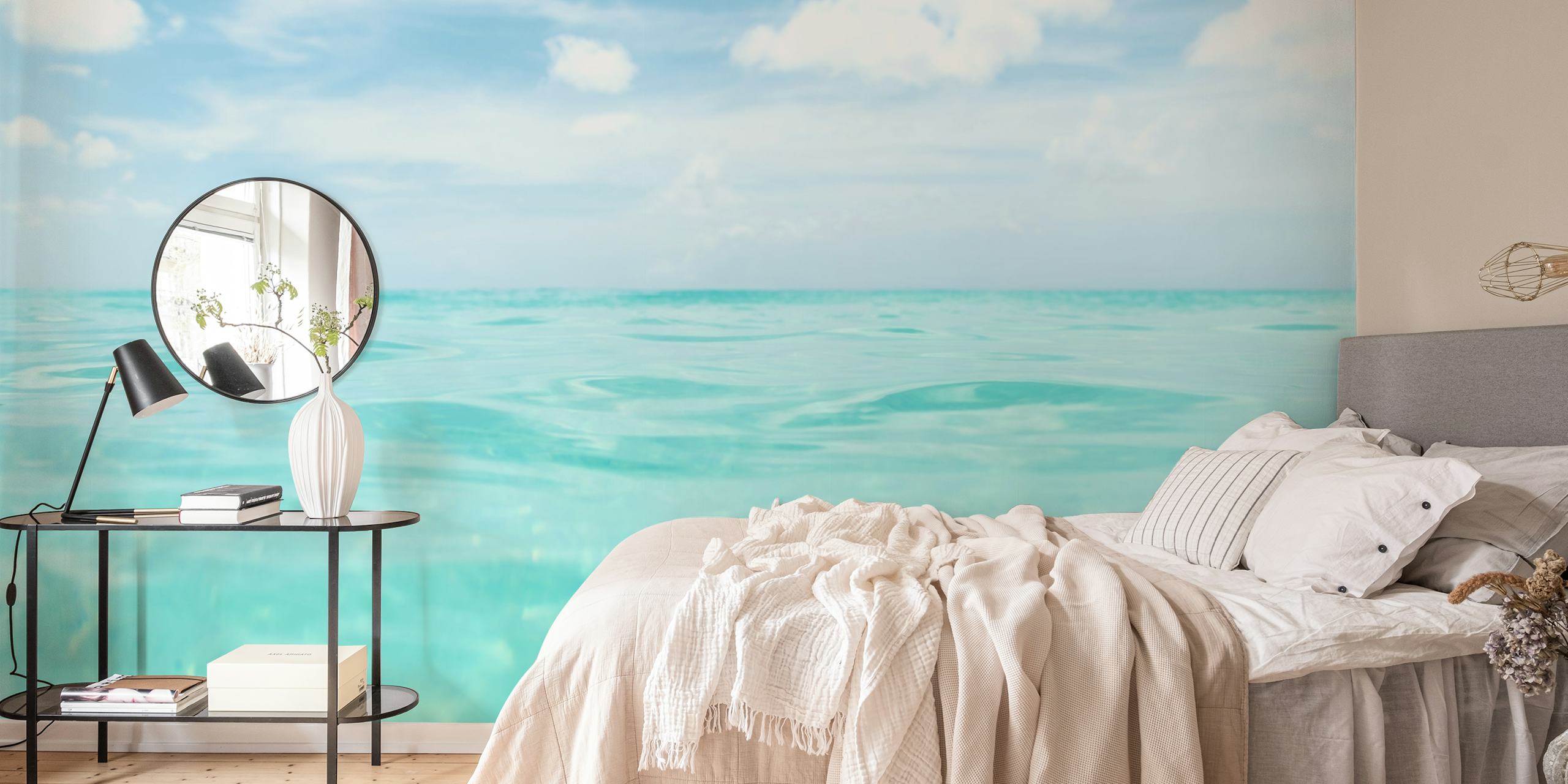 Calming turquoise water with clouds wallpaper