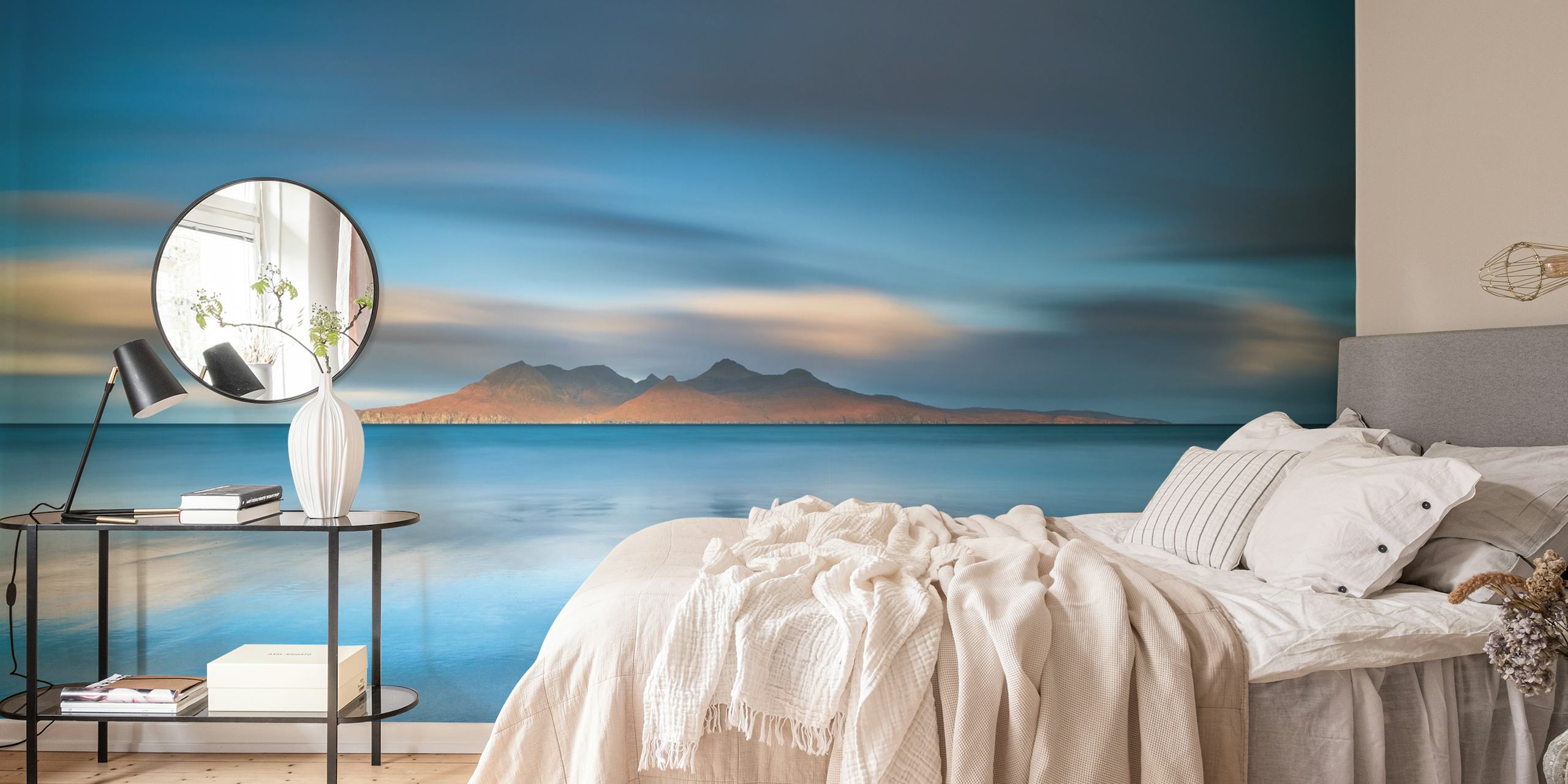 Epic sunrise over the ocean and island, blue tones wallpaper