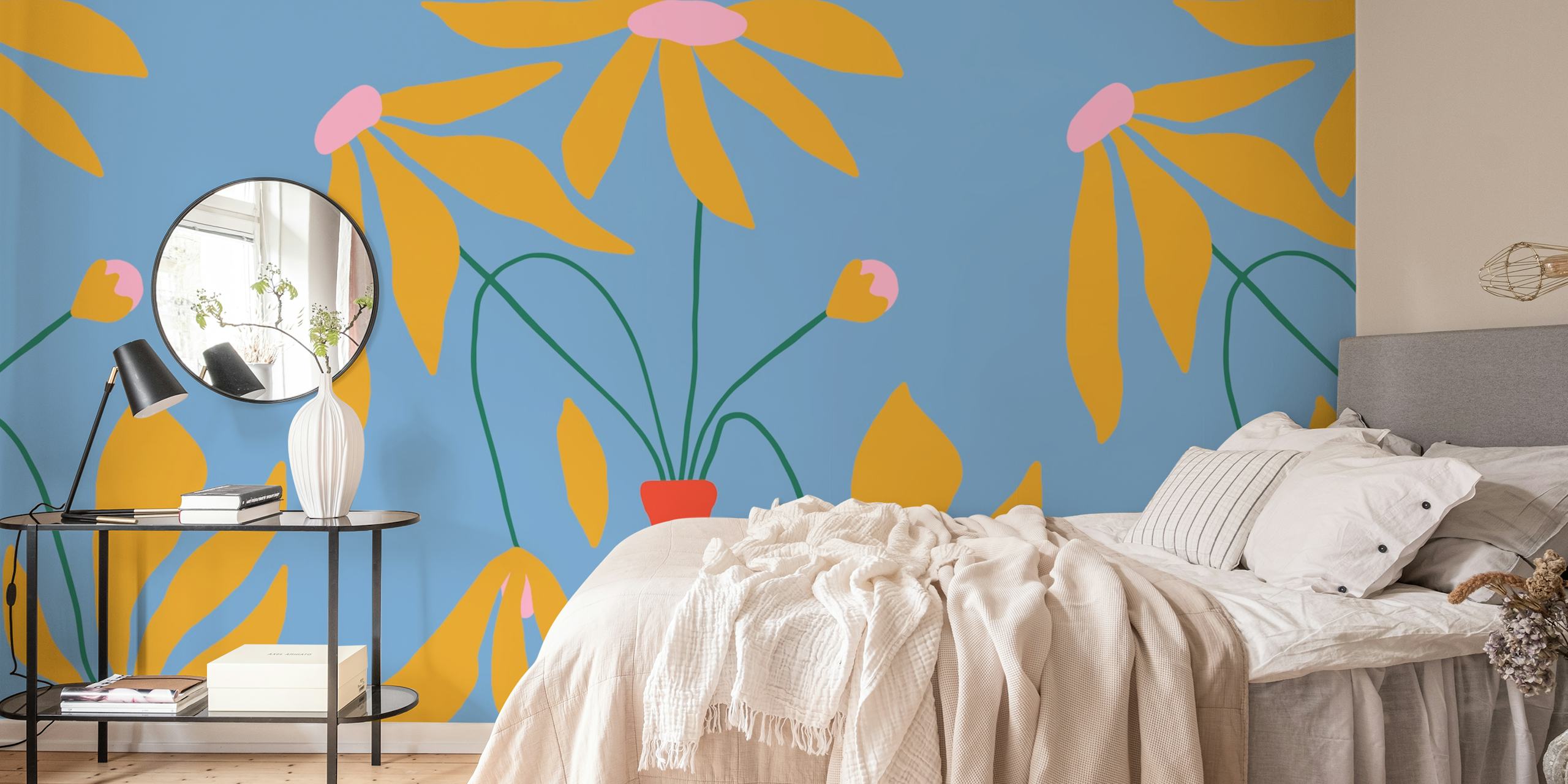 Colorful floral design with yellow petals and pink accents on blue wallpaper